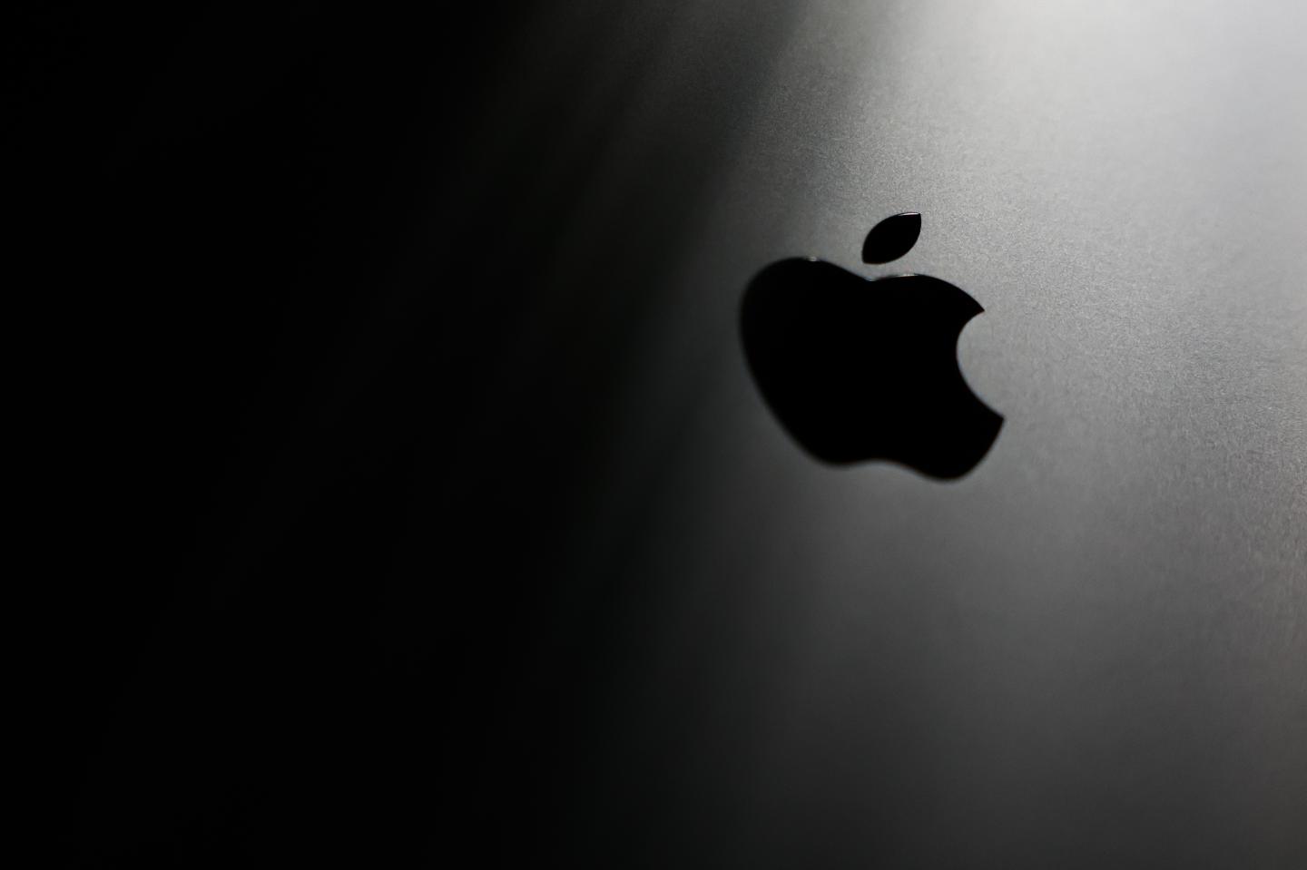 An Apple logo appearing on a MacBook laptop in 2025. (Photo: Jakub Porzycki/NurPhoto/Getty Images)