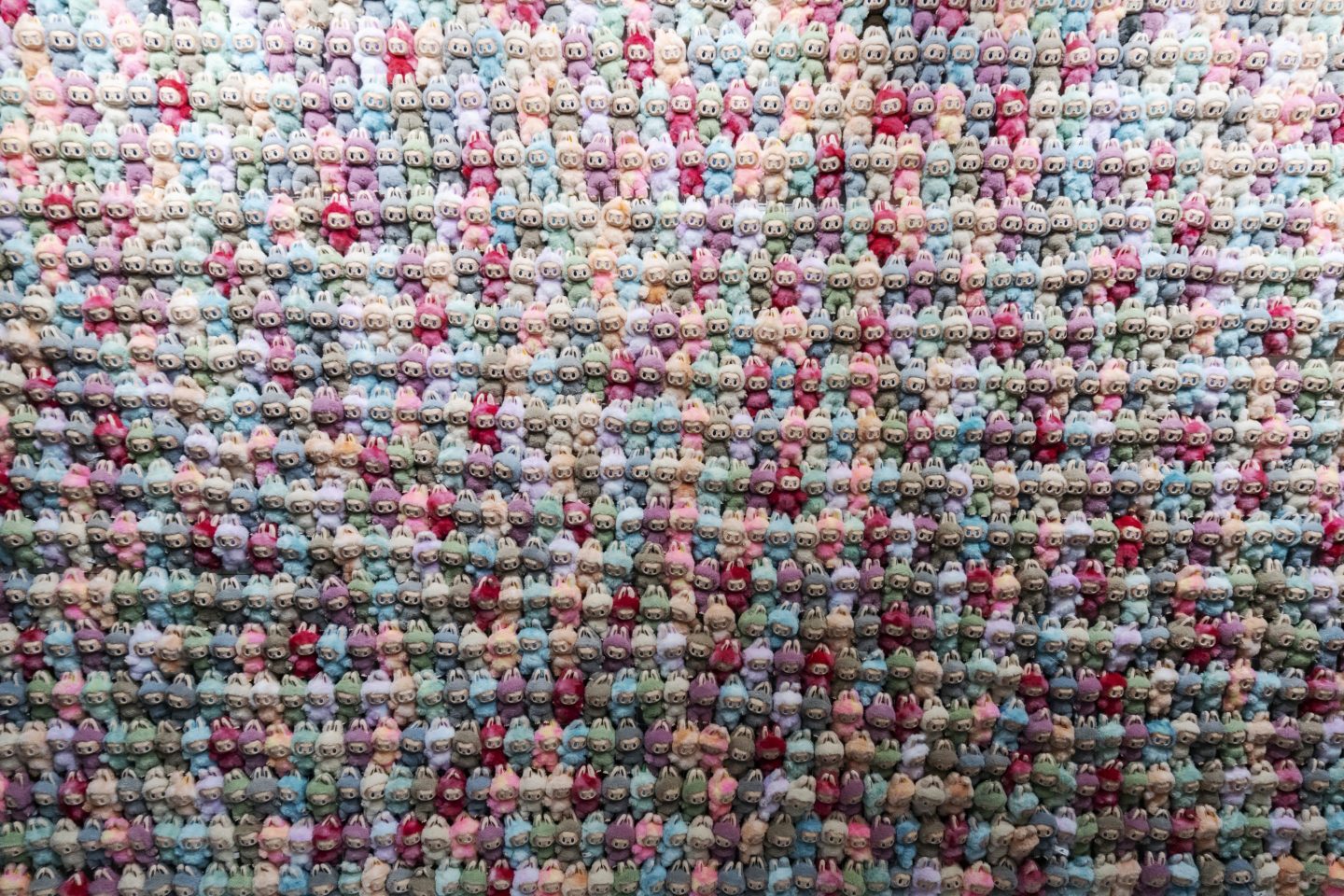 A wall of Labubu dolls on display at Pop Mart International Group Ltd.'s "Monsters by Monsters, Now and Then" show in Shanghai, China, on Wednesday, Oct. 15, 2025. Pop Mart shares climbed the most in nearly two months after Apple Inc. Chief Executive Officer Tim Cook's visit to a Labubu exhibition rekindled investor enthusiasm over the Chinese toymaker. Photographer: Qilai Shen/Bloomberg via Getty Images