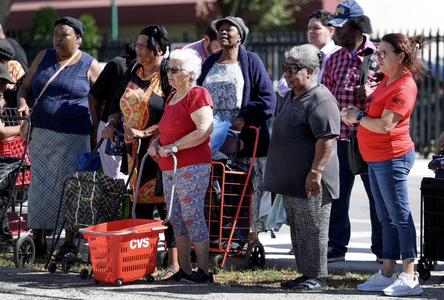People in need wait in line to receive groceries from Curley's House Food Bank days before the Supplemental Nutrition Assistance Program (SNAP) benefits may expire due to the Federal government shutdown on October 30, 2025 in Miami, Florida.