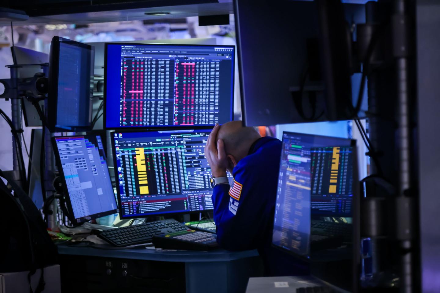 A trader works during the Beta Technologies Inc. initial public offering (IPO) on the floor at the New York Stock Exchange (NYSE) in New York, US, on Tuesday, Nov. 4, 2025.
