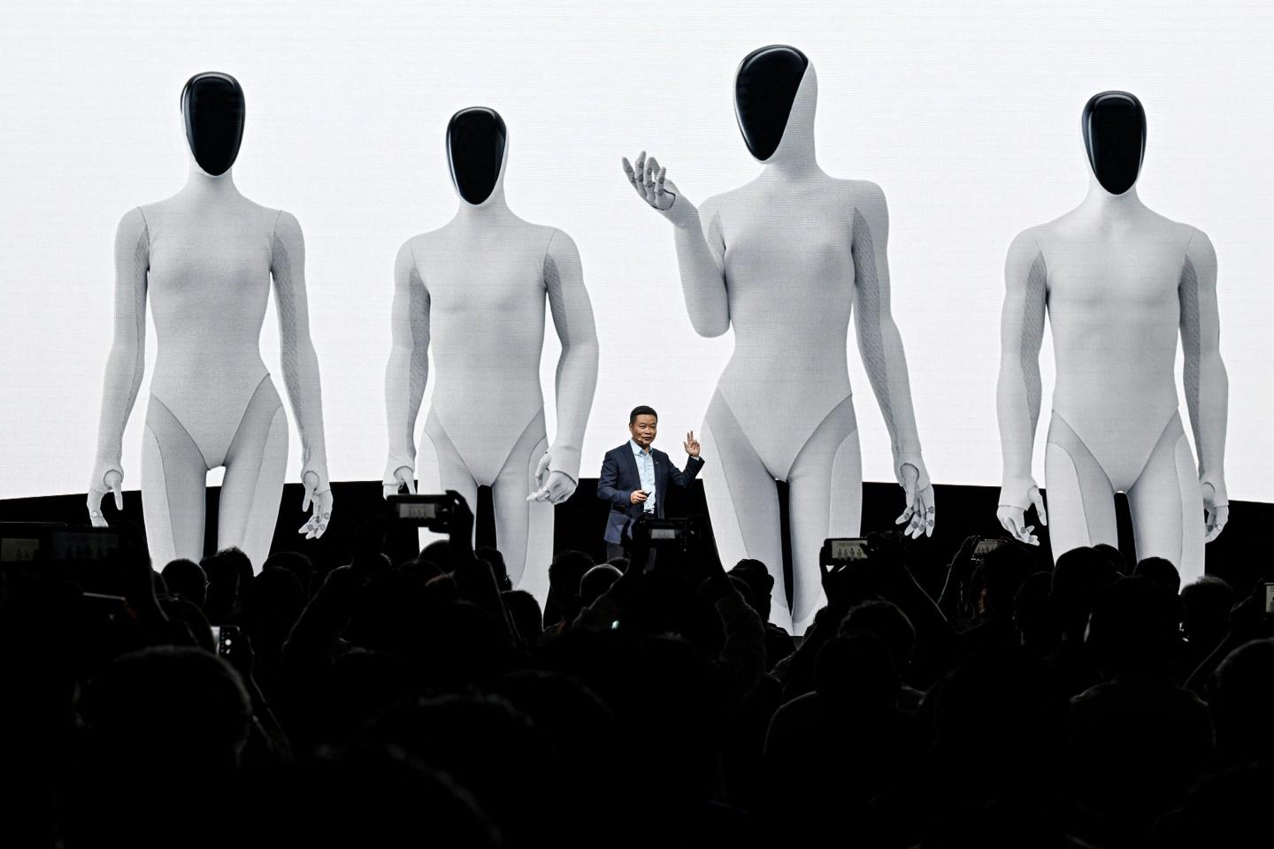 Xpeng CEO He Xiaopeng launches its Iron humanoid robot during AI Day at its headquarters in Guangzhou, China on Nov. 5, 2025.
