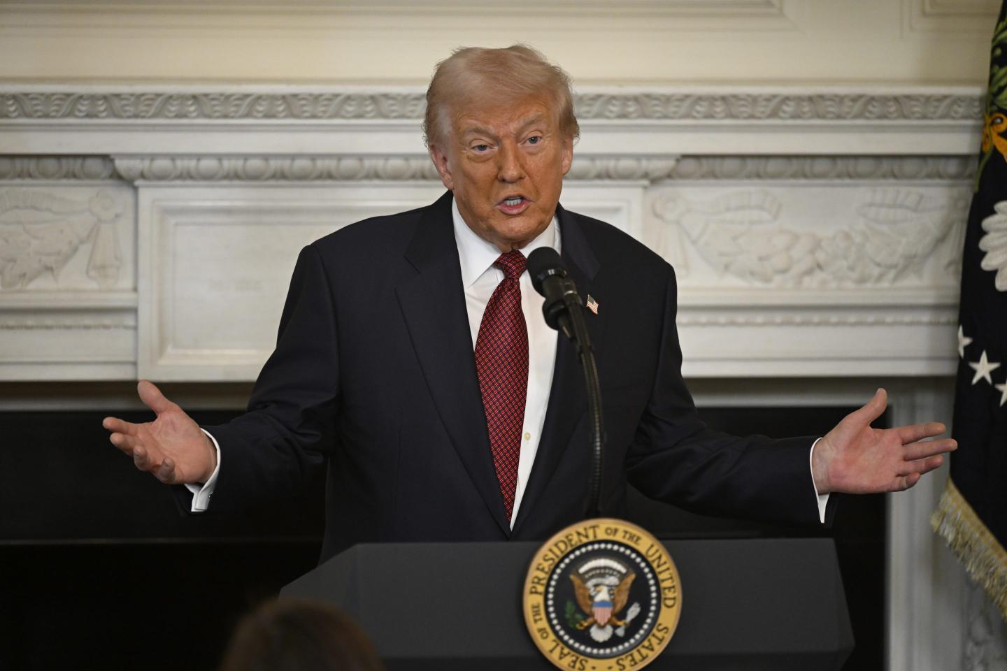 President Donald Trump addresses a breakfast for Republican senators in the State Dinning at the White House in Washington, DC on November 5, 2025.