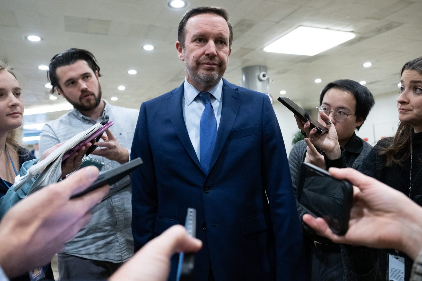 US Senator Chris Murphy, Democrat of Connecticut, speaks with reporters as he arrives for Senate votes to reopen the government on day 41 of the government shutdown at the US Capitol in Washington, DC, November 10, 2025.