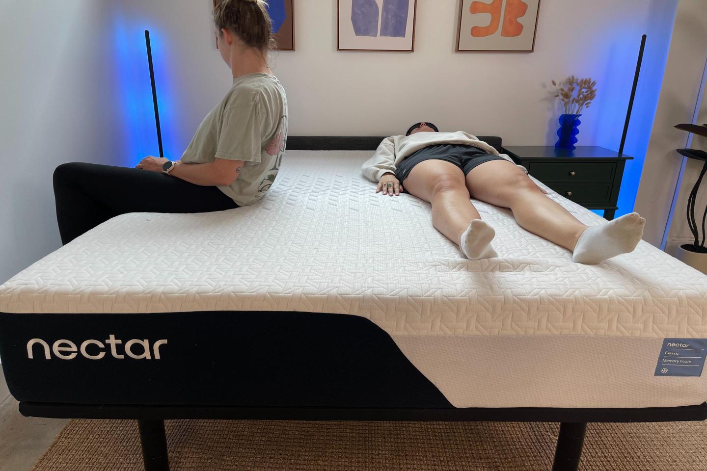 Our testers trying out a Nectar mattress.