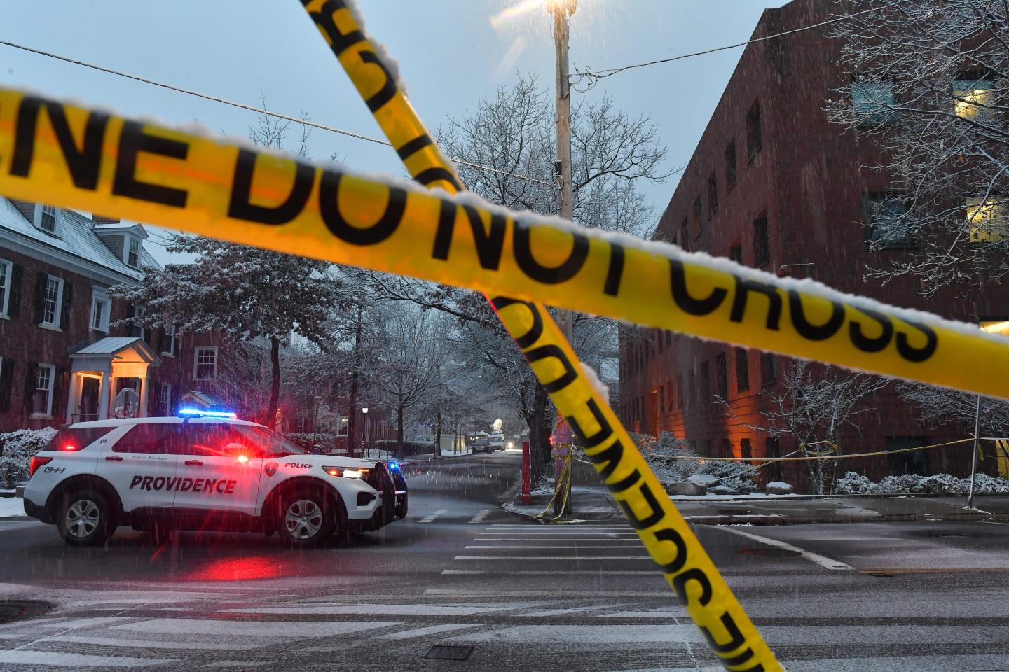 Police have person of interest in custody over Brown University shooting that killed 2, wounded 9