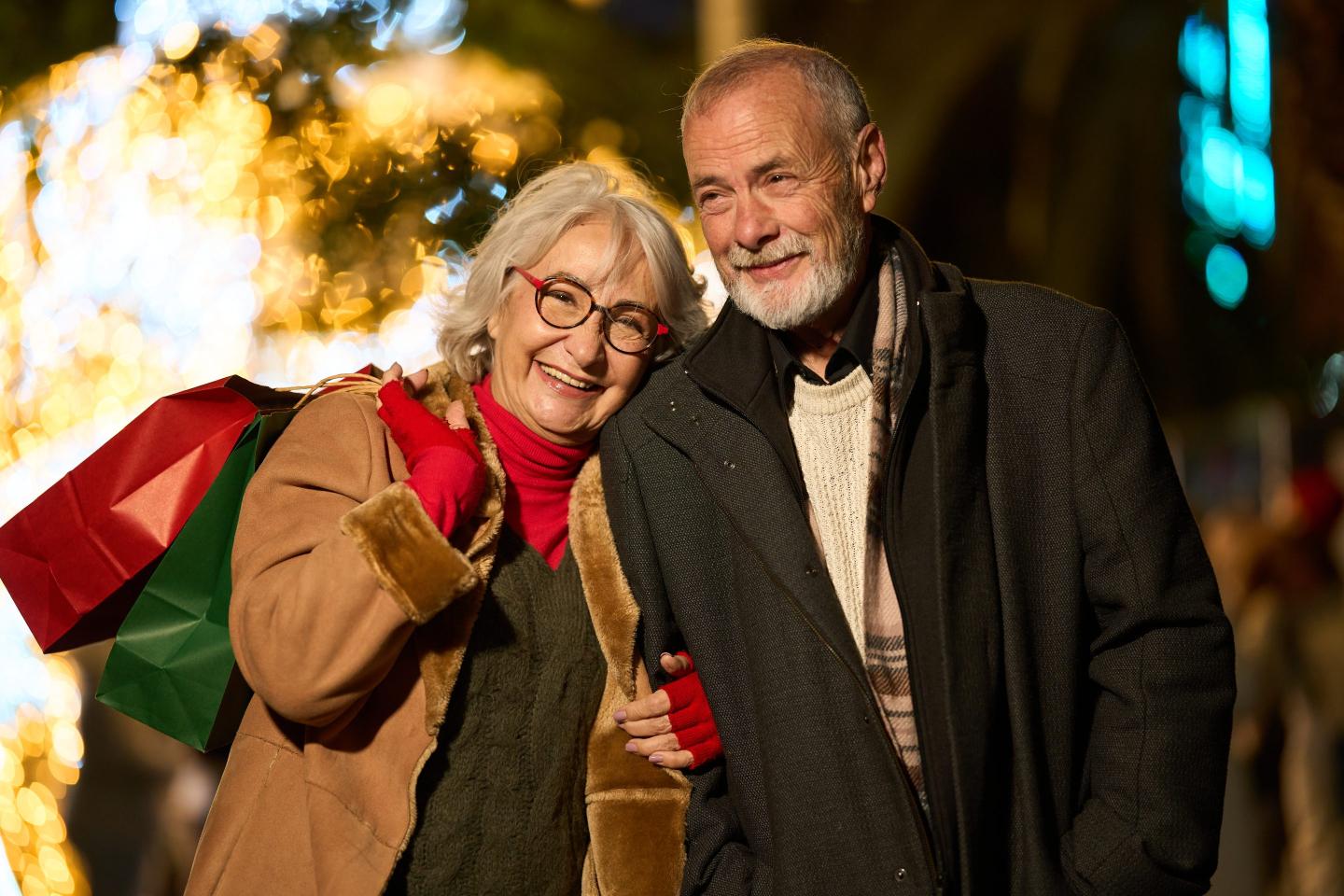 An older couple, smiling
