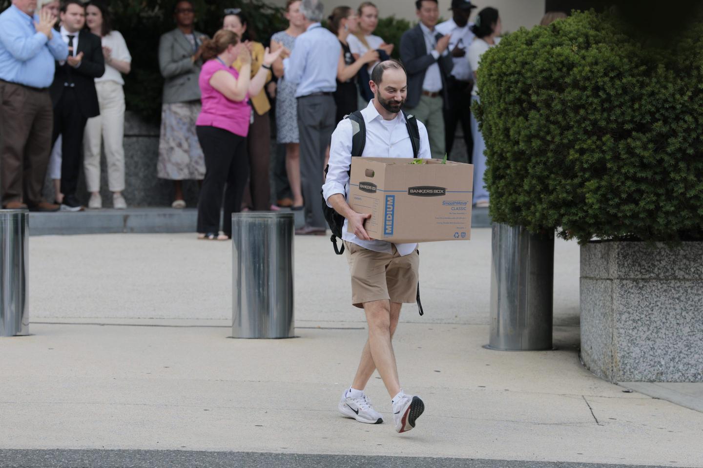 Man carrying a cardboard box