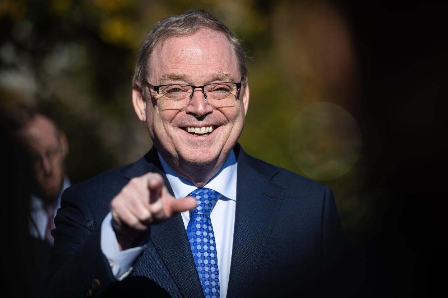 members of the media outside the White House in Washington, DC, US, on Friday, Oct. 24, 2025. Hassett said that Chinese actions on trade in the last few weeks have been "unacceptable," but there has been "sort of a thawing" in US-China relations in recent days as conversations