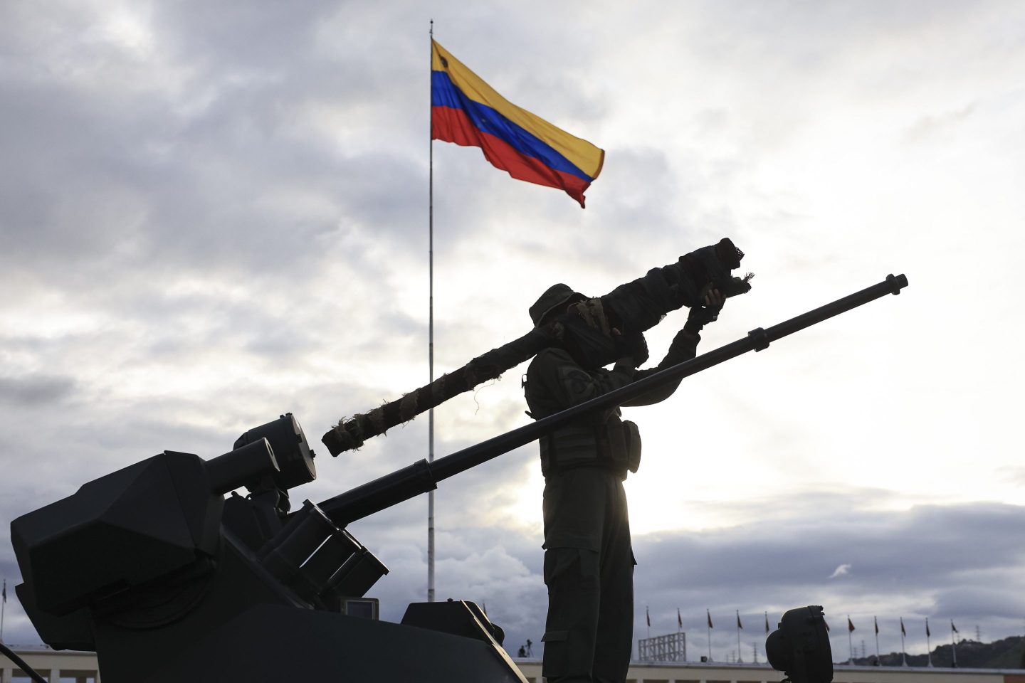 CARACAS, VENEZUELA - A member of the Bolivarian National Armed Forces holds an "Igla-S" rocket launcher during a military ceremony commemorating the 200th anniversary of the presentation of the 'Sword of Peru' to Venezuelan independence hero Simón Bolívar on November 25, 2025, in Caracas, Venezuela. The United States recently designated the "Cartel De Los Soles" (Cartel of The Suns) as a foreign terrorist organization, a group allegedly led by the president of Venezuela, Nicolas Maduro, and which, it is presumed, includes high-ranking members of the Venezuelan government.