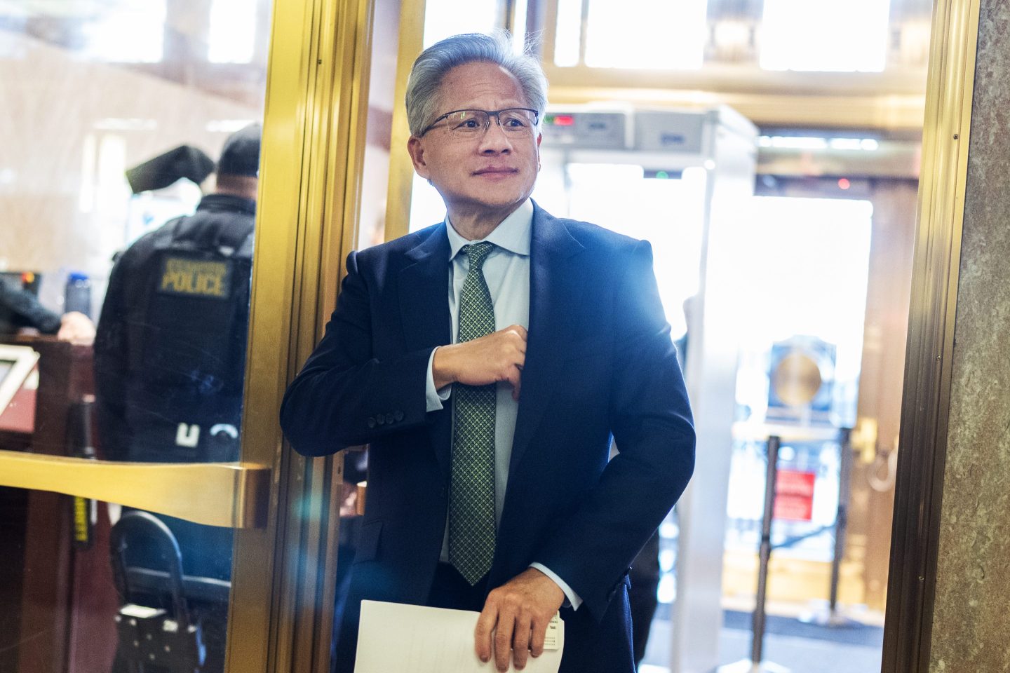 Nvidia CEO Jensen Huang arrives for a meeting with Republican members of the Senate Banking Committee in the Dirksen building on Wednesday, December 3, 2025.