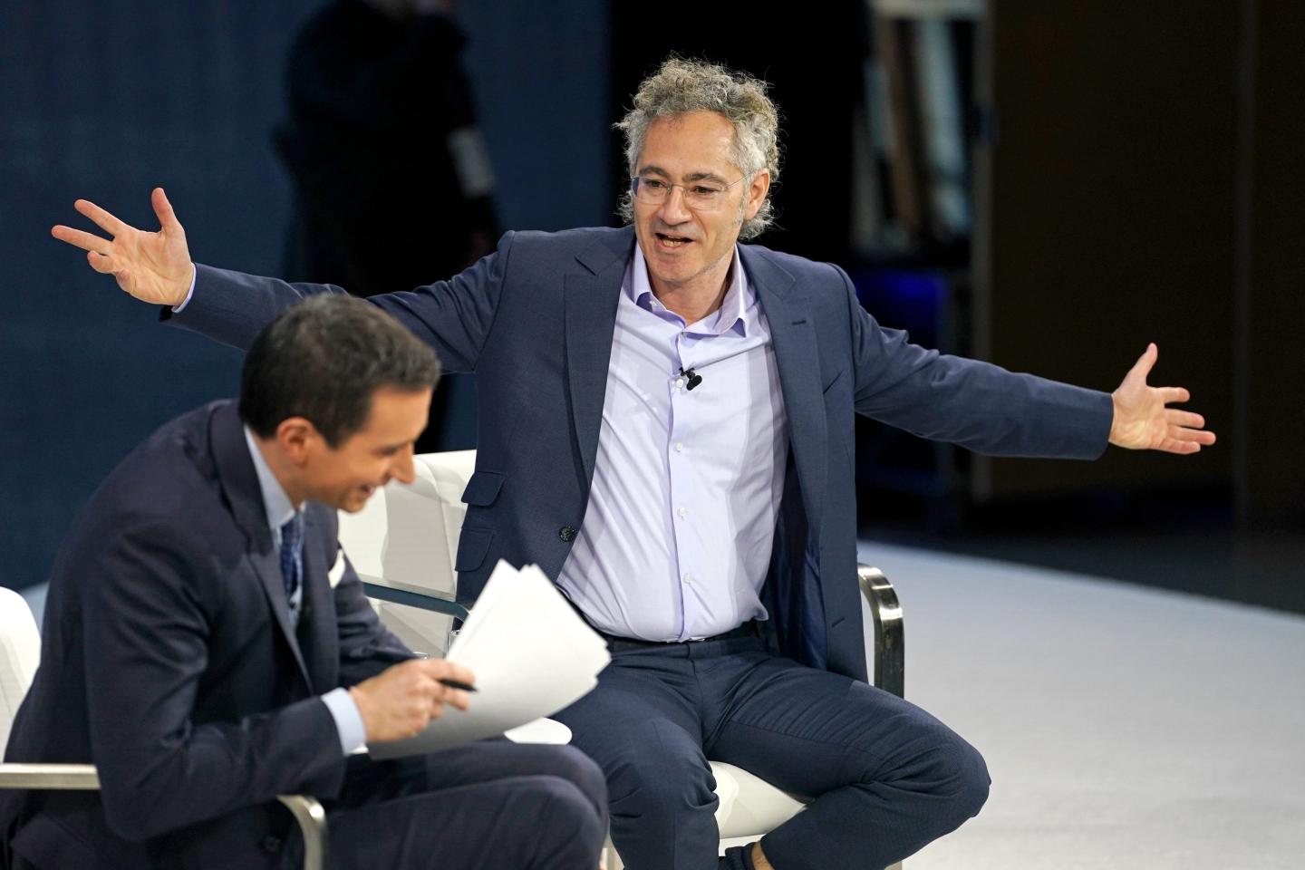 Andrew Ross Sorkin and Alex Karp speak onstage during The New York Times DealBook Summit 2025 at Jazz at Lincoln Center on December 03, 2025 in New York City.