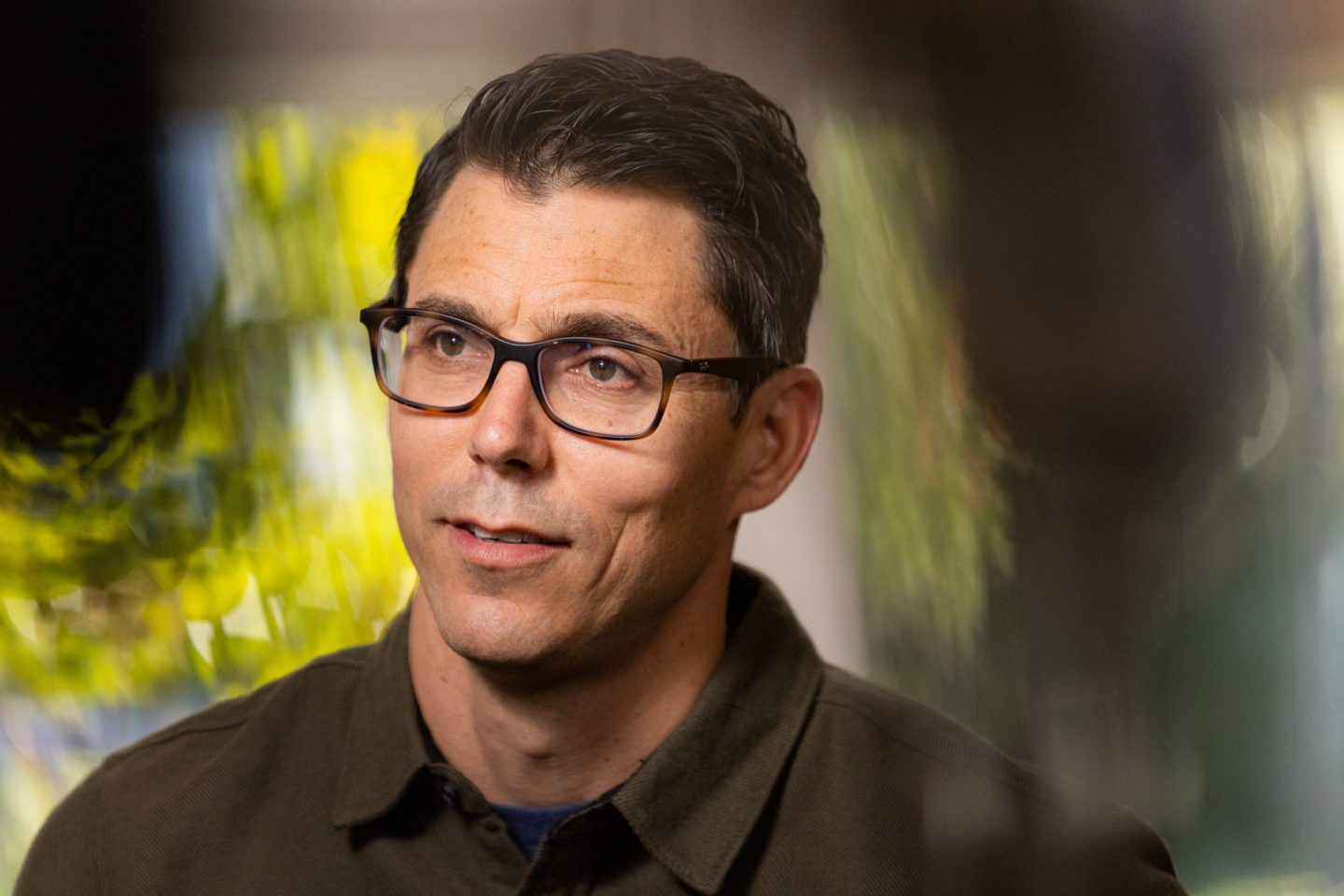 RJ Scaringe, chief executive officer and founder of Rivian Automotive Inc., during an interview at the company's offices in Palo Alto, California, US, on Wednesday, Dec. 10, 2025. Rivian Automotive Inc. has developed its own artificial intelligence chip, replacing Nvidia Corp. technology as part of a broader push to add automated-driving features to future vehicles. Photographer: Jason Henry/Bloomberg via Getty Images