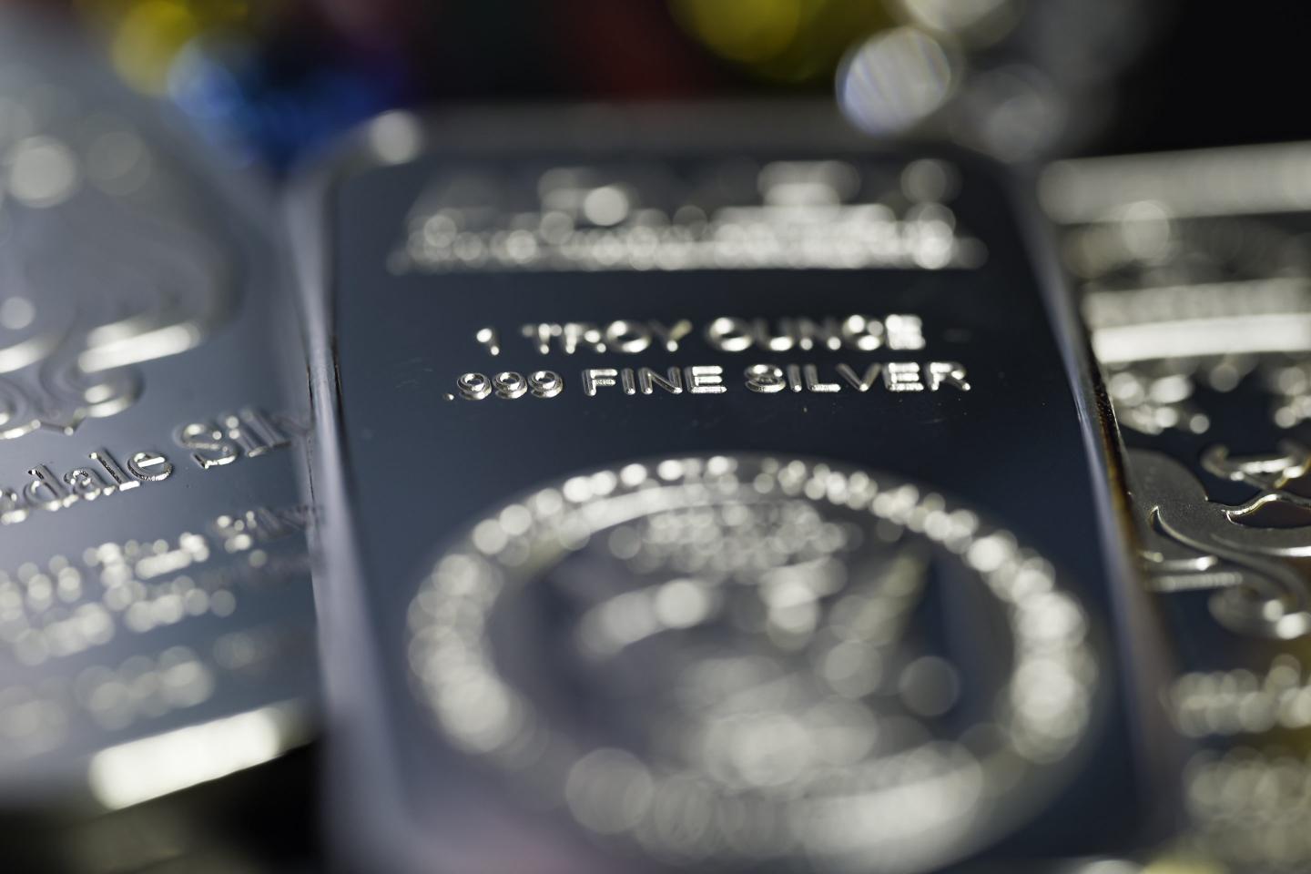 Silver pulls back after topping $80 in historic year-end rally