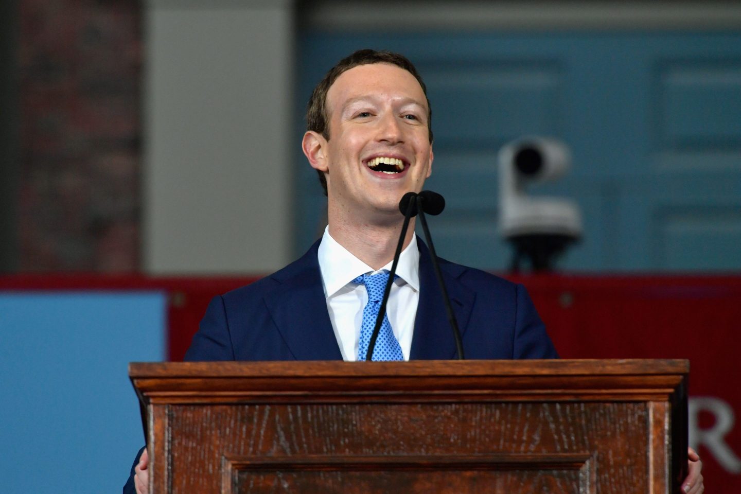 Mark Zuckerberg laughs during his 2017 Harvard commencement speech