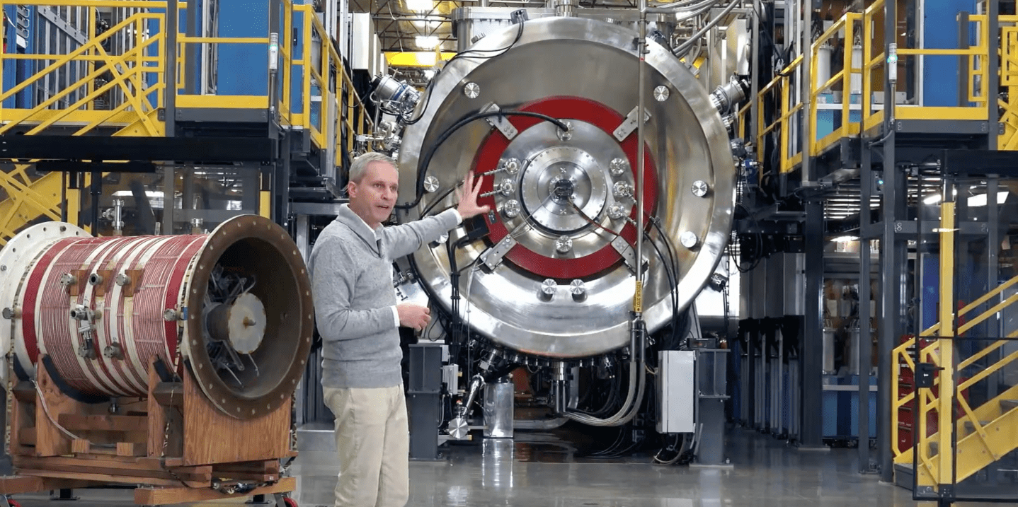 CEO Michl Binderbauer shows off TAE Technologies' pilot nuclear energy components.