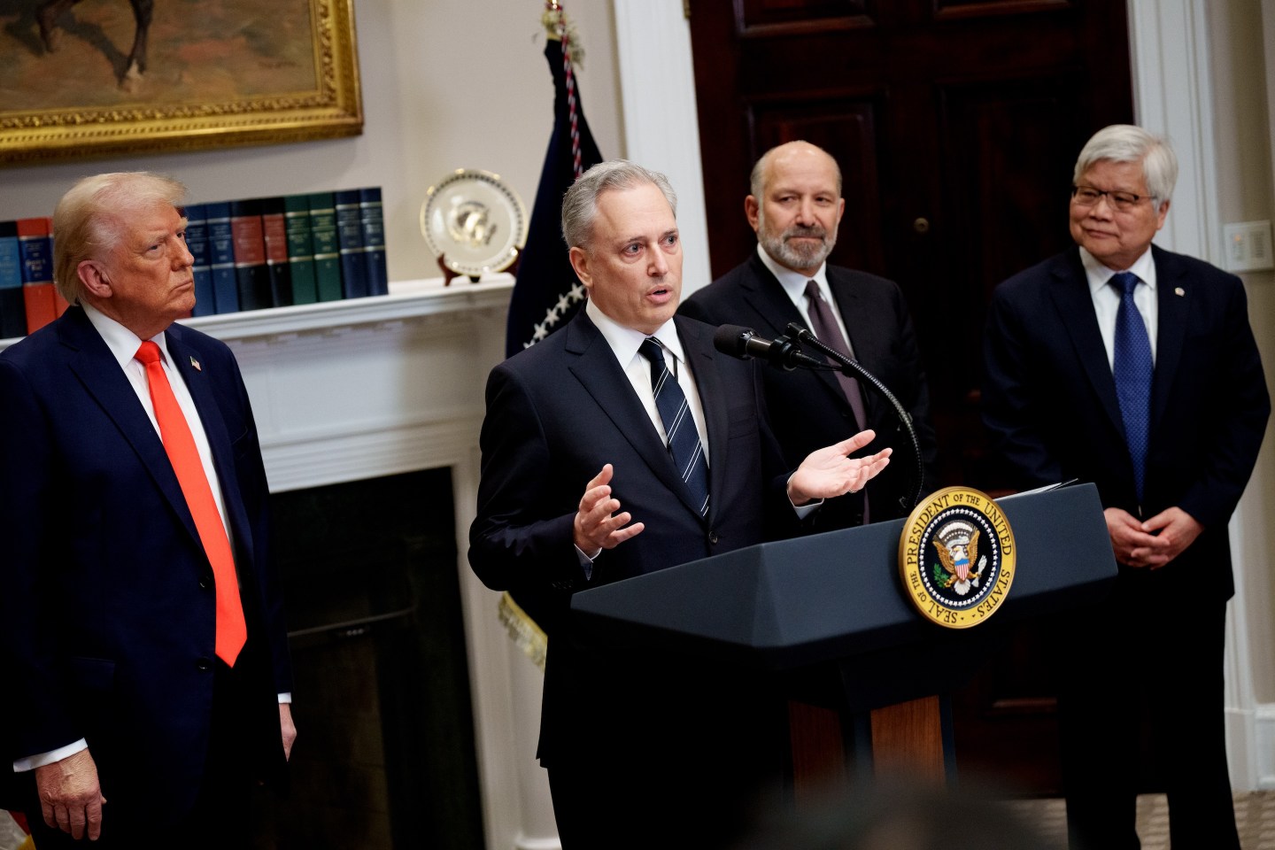 WASHINGTON, DC - MARCH 03: David Sacks, U.S. President Donald Trump's AI and Crypto Czar (C), accompanied by U.S. President Donald Trump (L), Taiwan Semiconductor Manufacturing Company (TSMC) CEO C.C. Wei (R), and accompanied by Commerce Secretary Howard Lutnick (2nd-R), speaks in the Roosevelt Room of the White House on March 3, 2025 in Washington, DC. Trump announced that Taiwan Semiconductor Manufacturing Company, one of the largest manufacturers of semiconductor chips, plans to invest $100 billion in new manufacturing facilities in the United States. (Photo by Andrew Harnik/Getty Images)