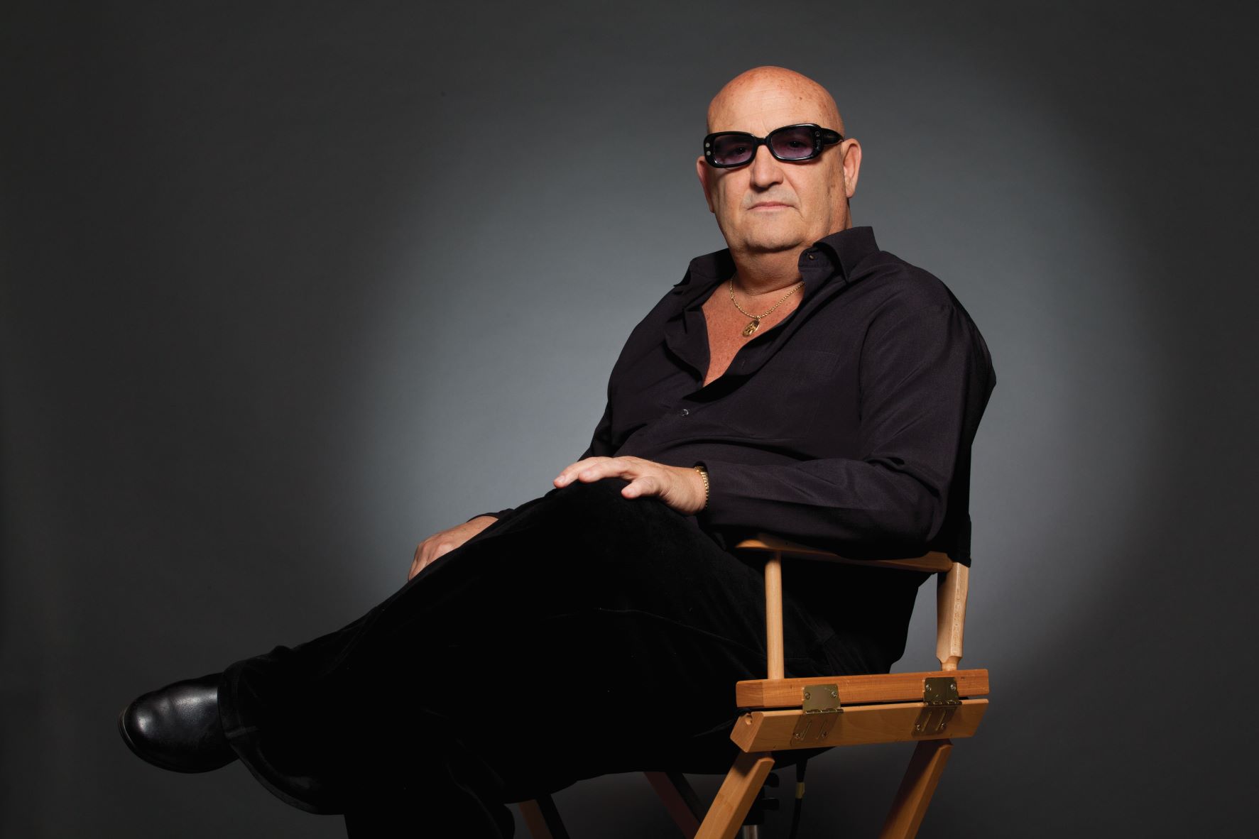 Tony Cuccio posing in a chair