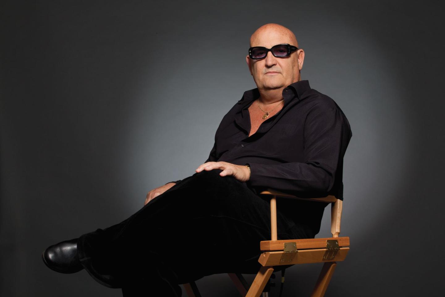 Tony Cuccio posing in a chair