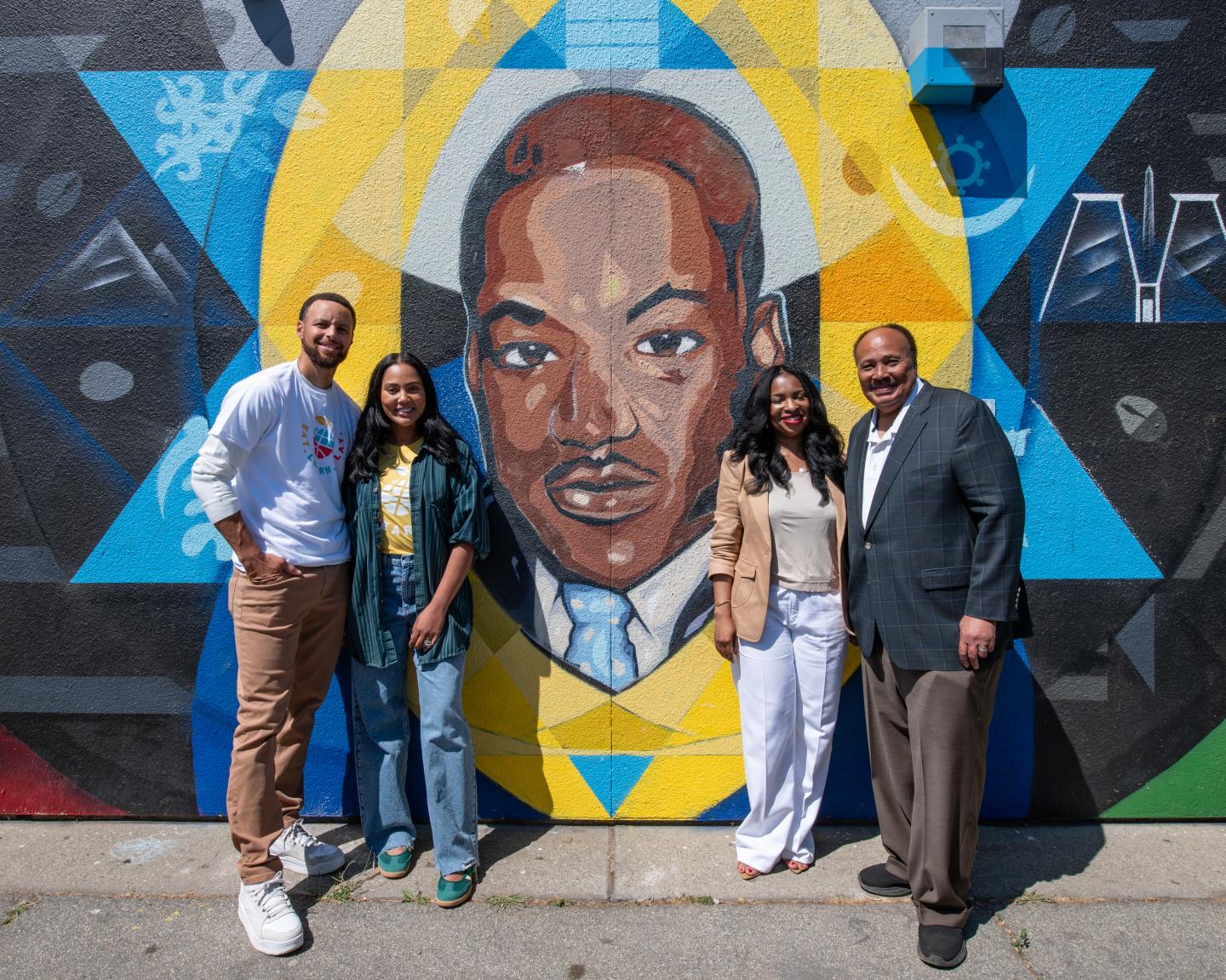 Ayesha and Stephen Curry (L) and Arndrea Waters King and Martin Luther King III (R), who are behind Eat.Play.Learn and Realize the Dream, respectively.