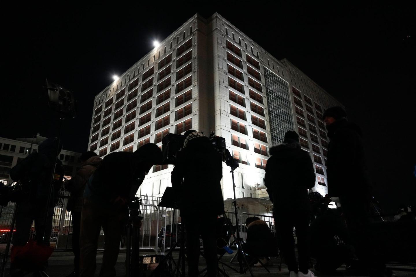 Members of the media gather outside the Metropolitan Detention Center where captured Venezuelan President Nicolas Maduro is being held, Saturday, Jan. 3, 2026, in New York.