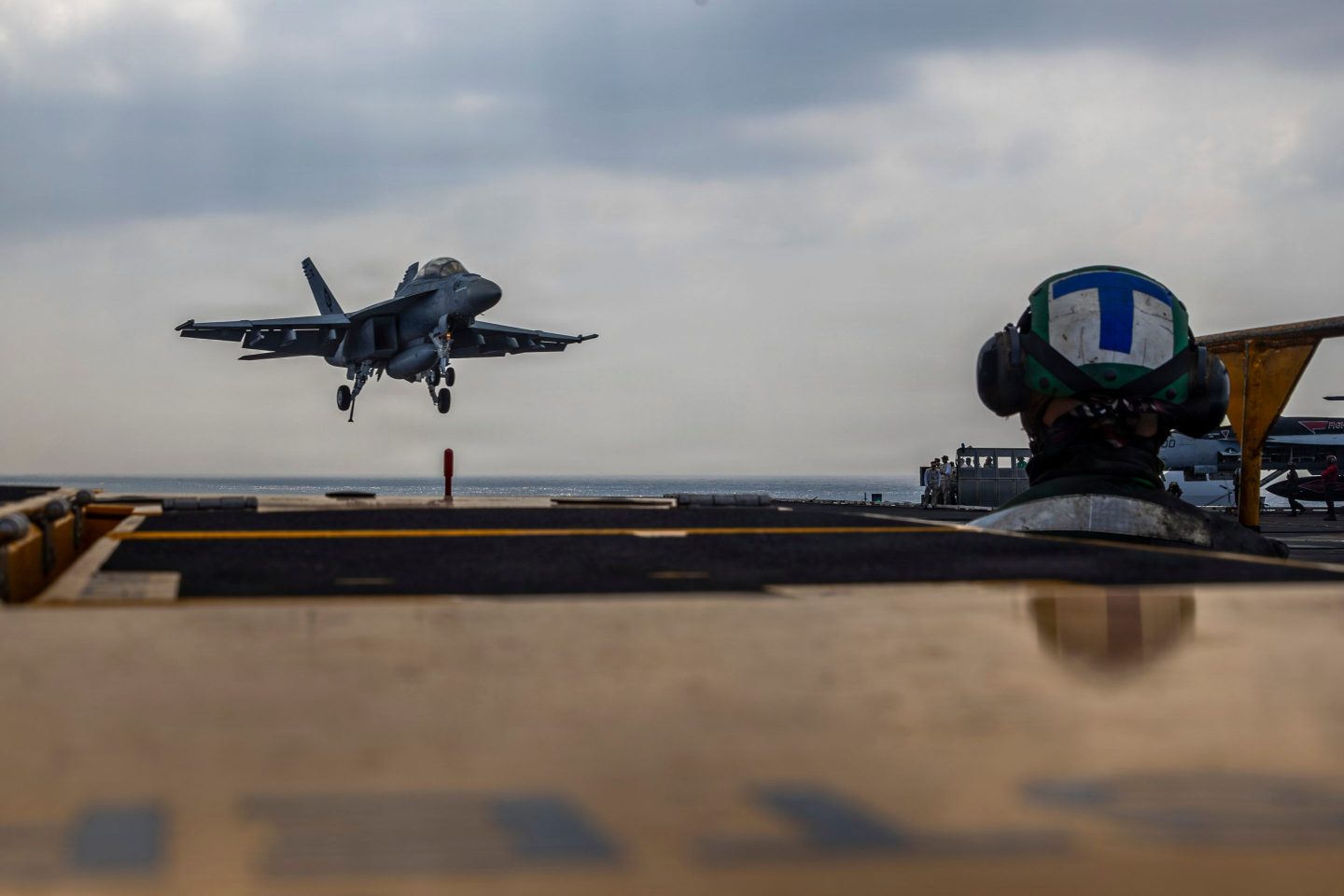 Carrier strike group with stealth fighters arrives in Mideast as Trump weighs Iran attack while Air Force jets and cargo planes also head to region