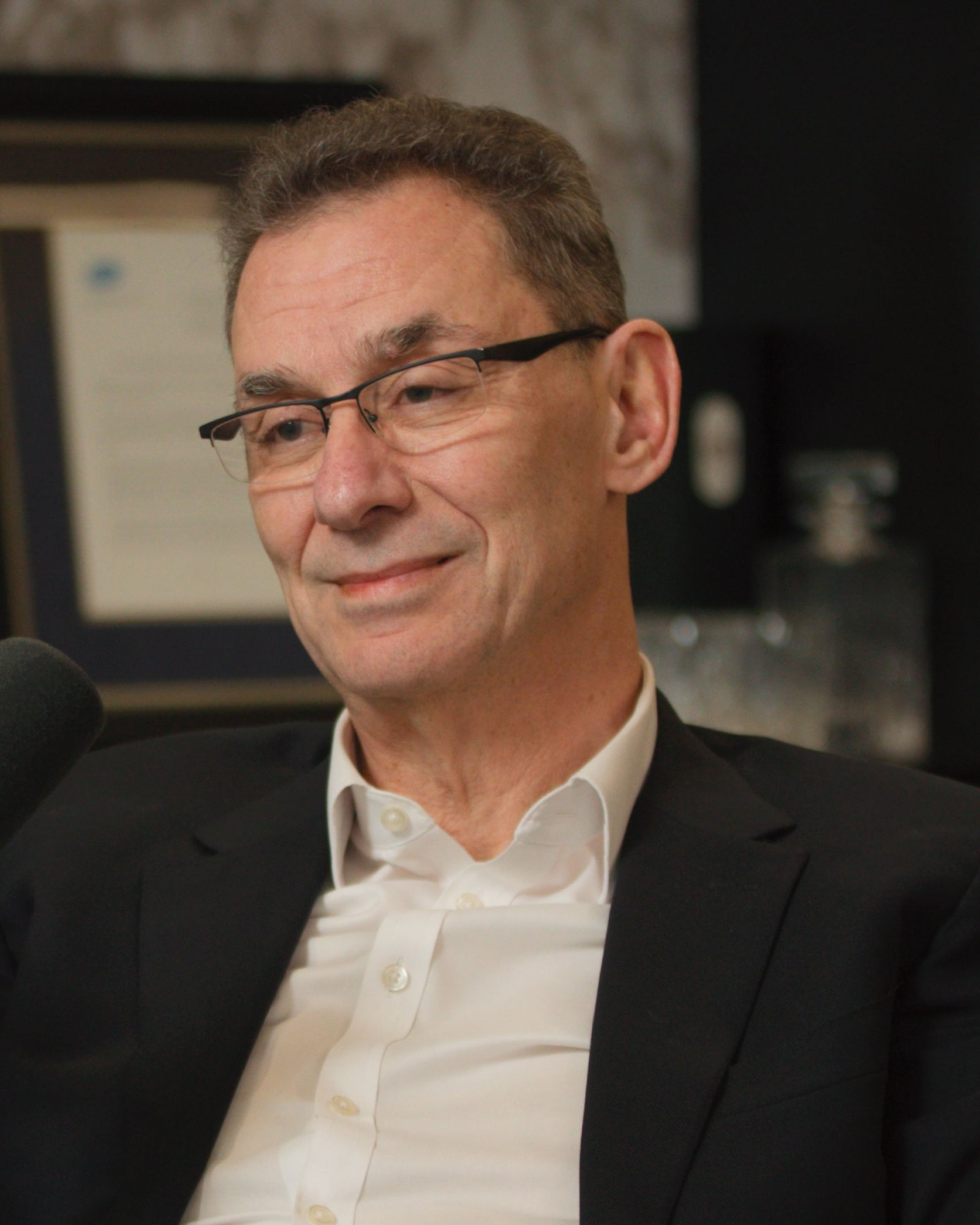 Graphic reads: Fortune Titans and Disruptors of Industry with Albert Bourla, CEO of Pfizer, Hosted by Alyson Shontell (both pictured).