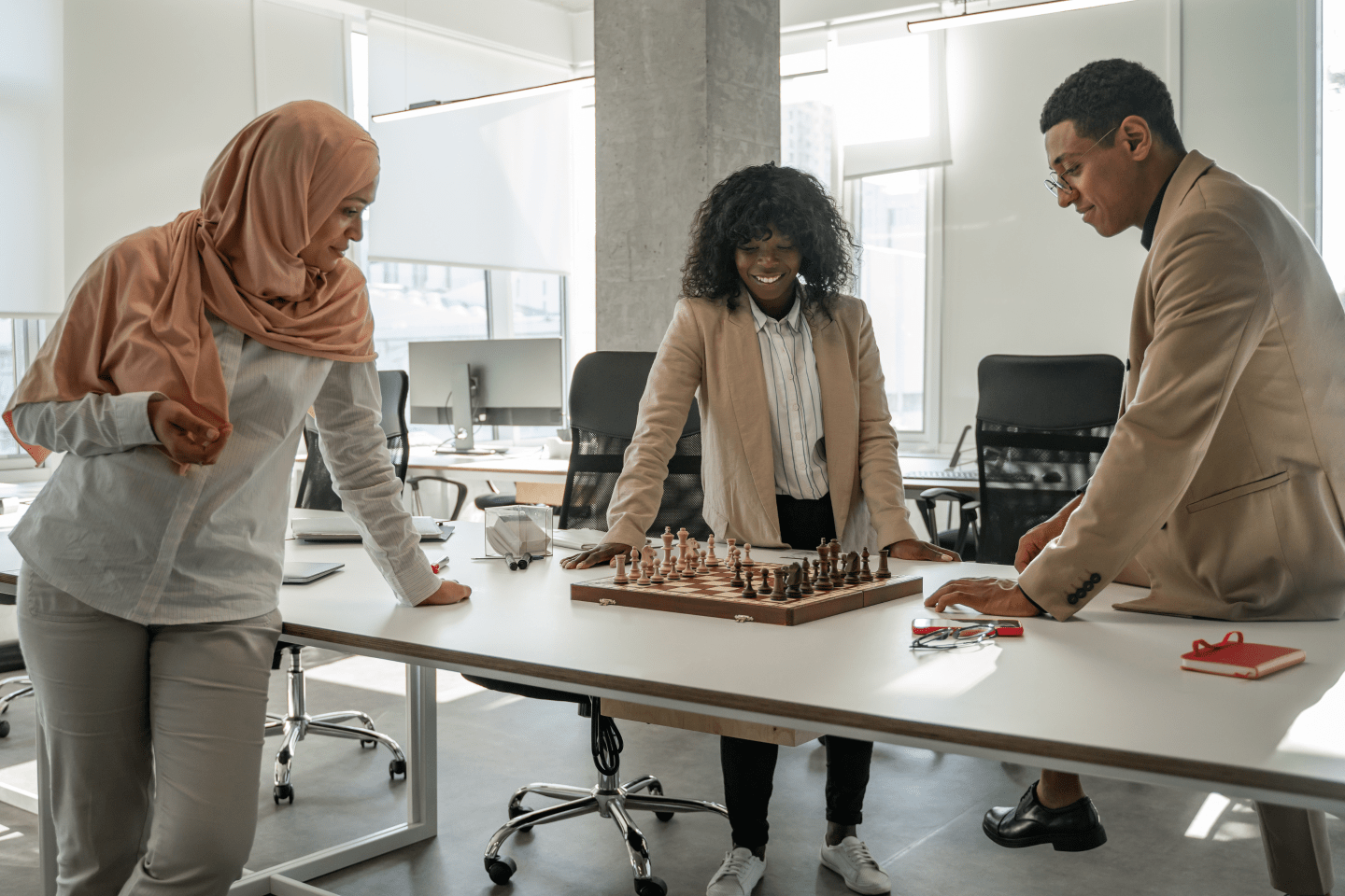 Workers playing a board game in the office