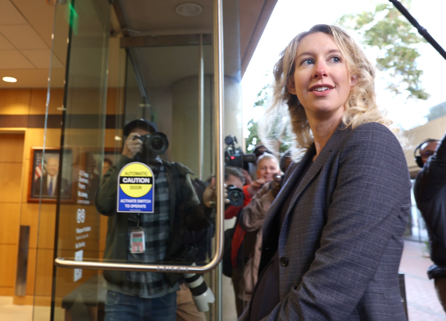 Elizabeth Holmes walks into the federal courthouse in San Jose, California.