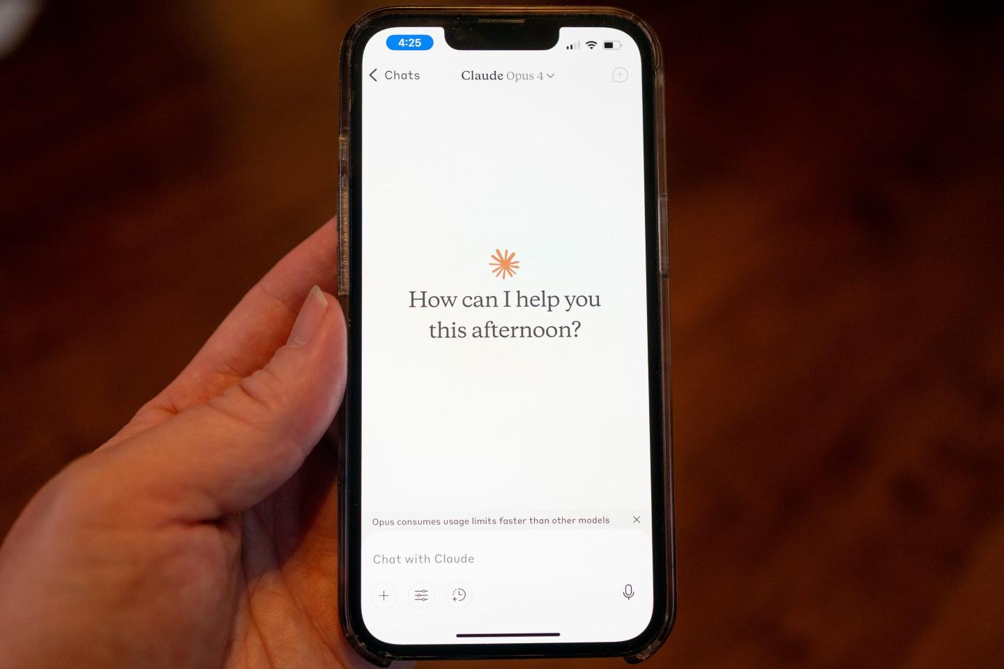 Illustration of Claude 4 open on a smartphone