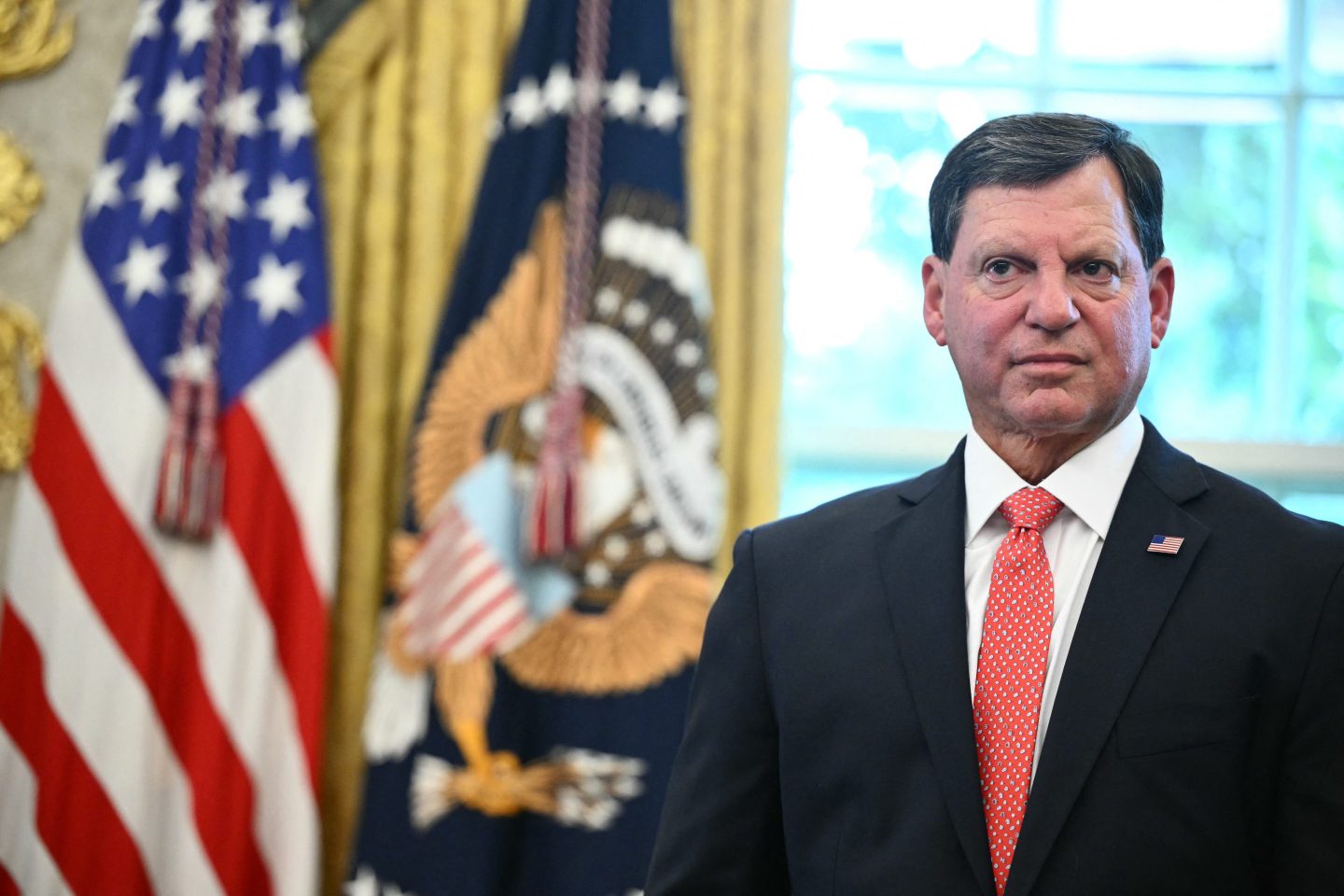 Commissioner of the Social Security Administration Frank Bisignano looks on as US President Donald Trump speaks prior to signing a presidential proclamation honoring the 90th anniversary of the Social Security Act in the Oval Office of the White House in Washington, DC on August 14, 2025. (Photo by Mandel NGAN / AFP) (Photo by MANDEL NGAN/AFP via Getty Images)