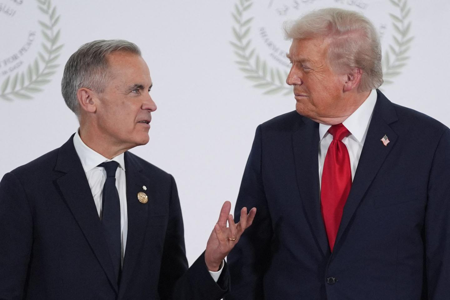 Photo: President Donald Trump greets Canadian Prime Minister Mark Carney during a summit on Gaza in Sharm el-Sheikh on October 13, 2025.
