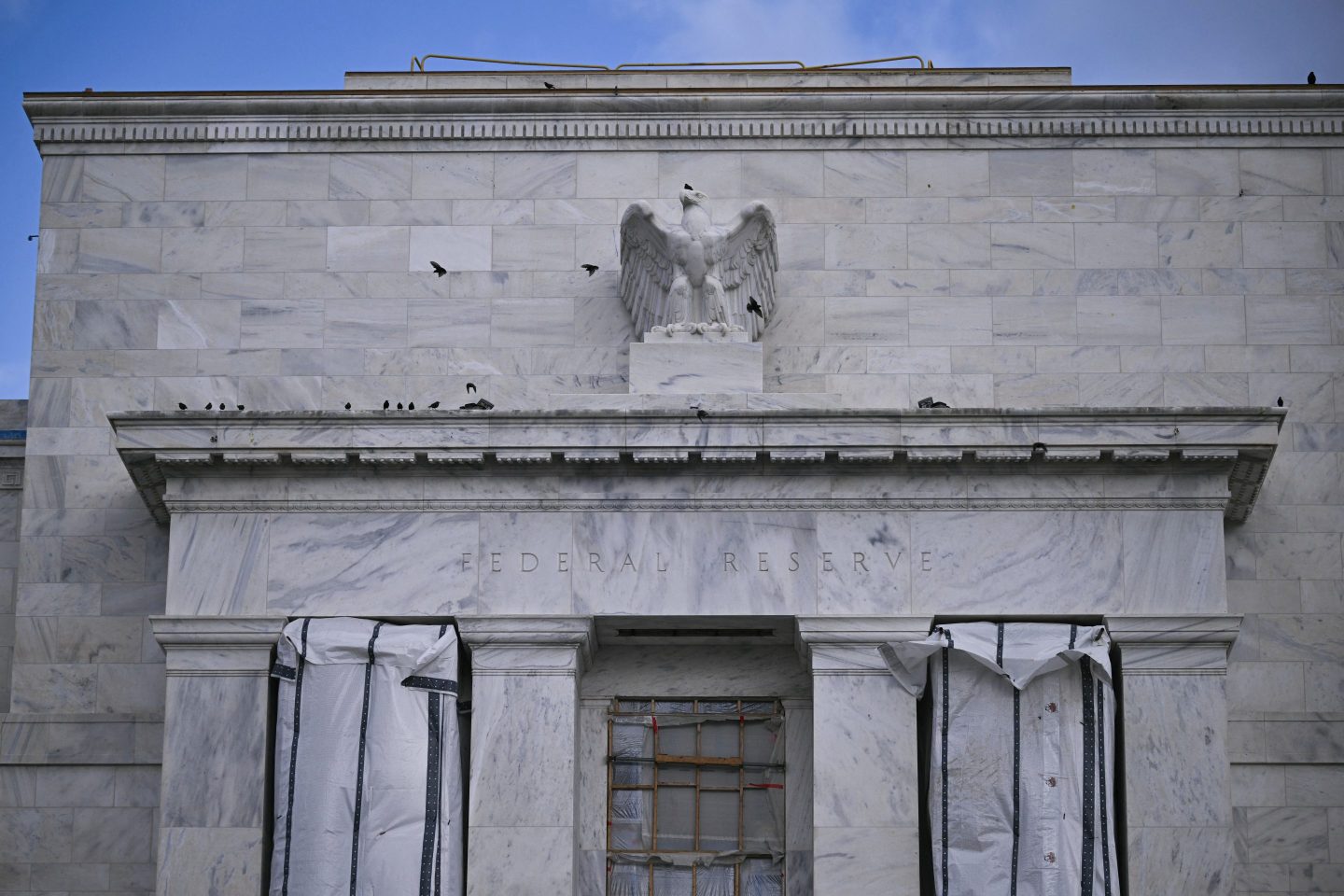 Construction work continues at the Marriner S. Eccles Federal Reserve building in Washington, DC, on December 30, 2025. (Photo by Brendan SMIALOWSKI / AFP via Getty Images)