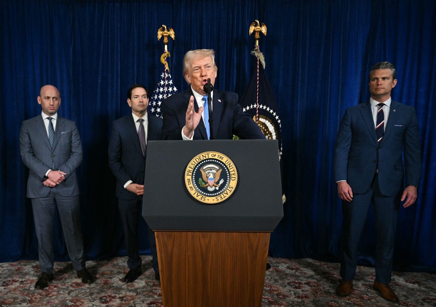 US President Donald Trump, alongside Deputy Chief of Staff Stephen Miller, Secretary of State Marco Rubio, and U.S. Secretary of Defense Pete Hegseth, speaks to the press following US military actions in Venezuela, at his Mar-a-Lago residence in Palm Beach, Florida, on Jan. 3. Trump said U.S. forces had captured Venezuelan leader Nicolas Maduro after launching a "large scale strike" on the South American country.