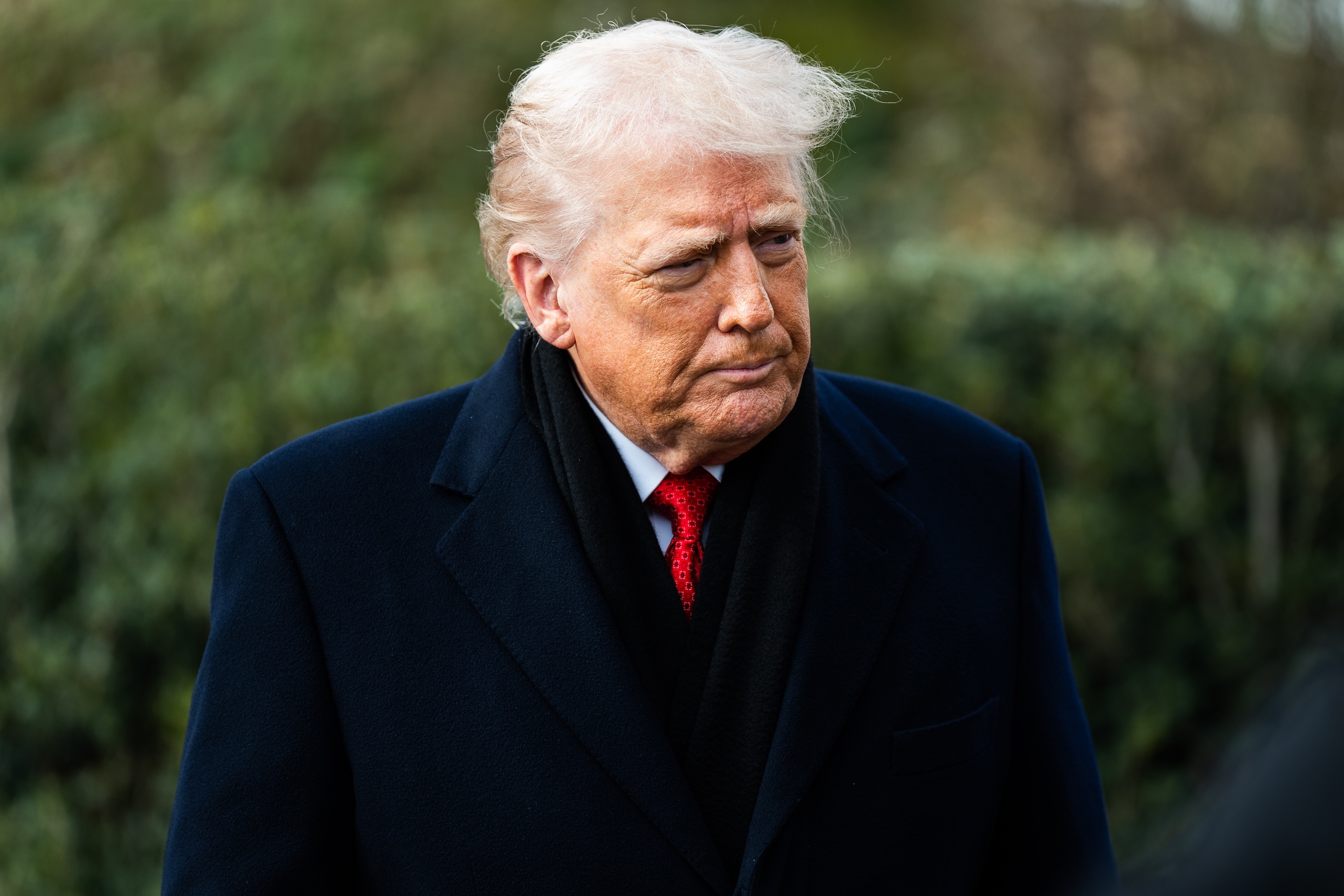 President Donald Trump speaks to the press on the South Lawn of the White House on Friday January 16, 2026. 