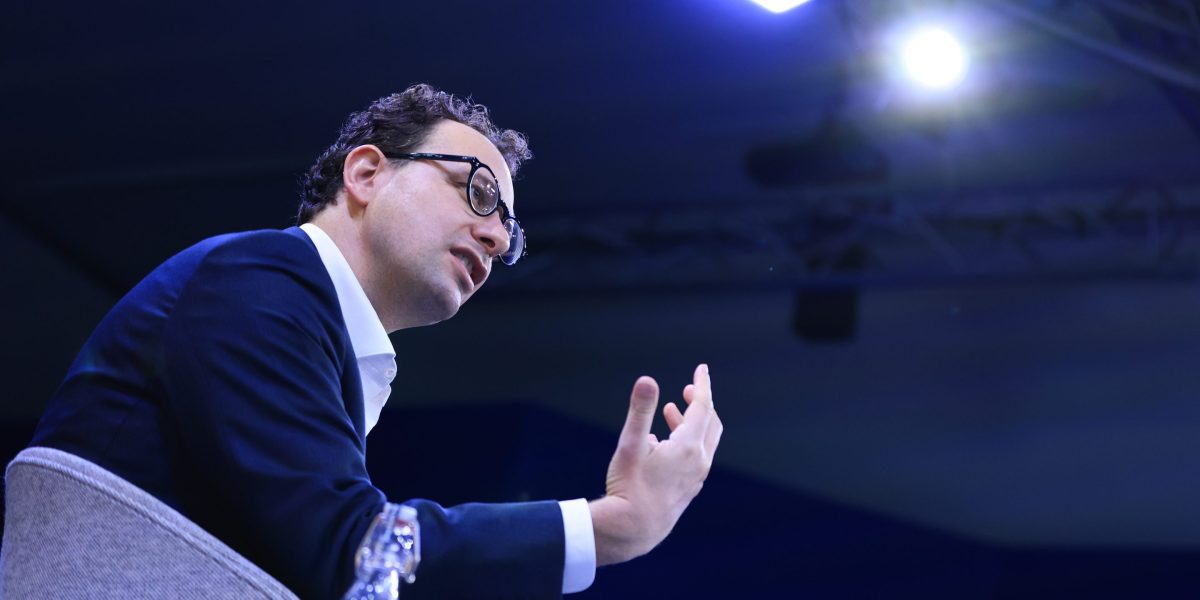 CEOs at Davos were split on how bad the AI job wipeout will be | Fortune