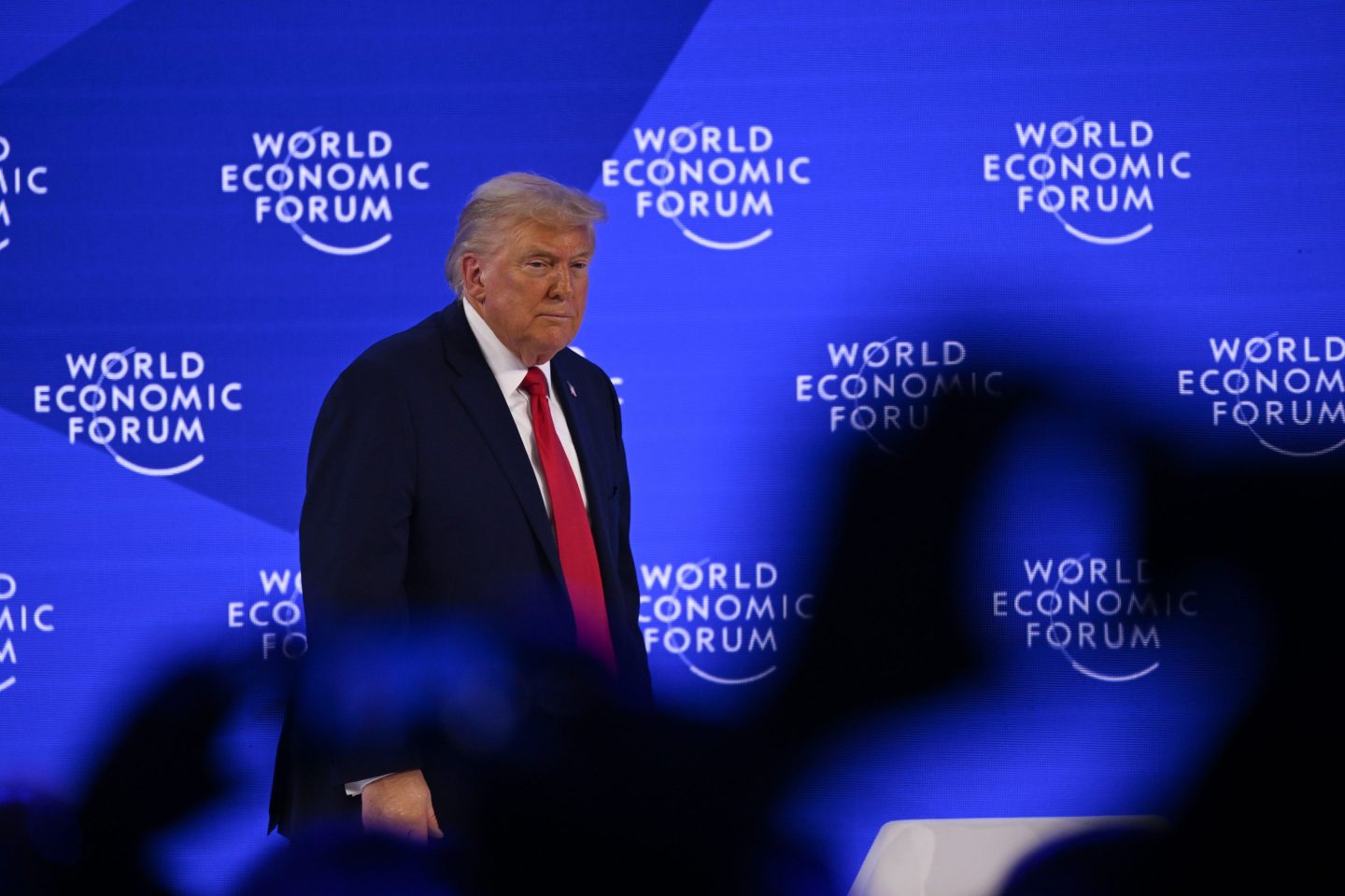 donald trump walks onstage at the world economic forum