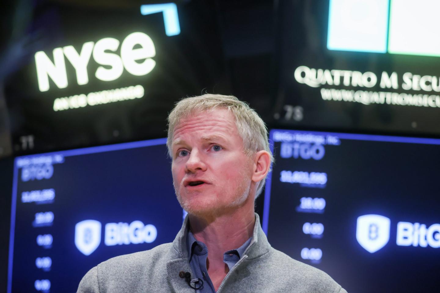 man speaks at new york stock exchange