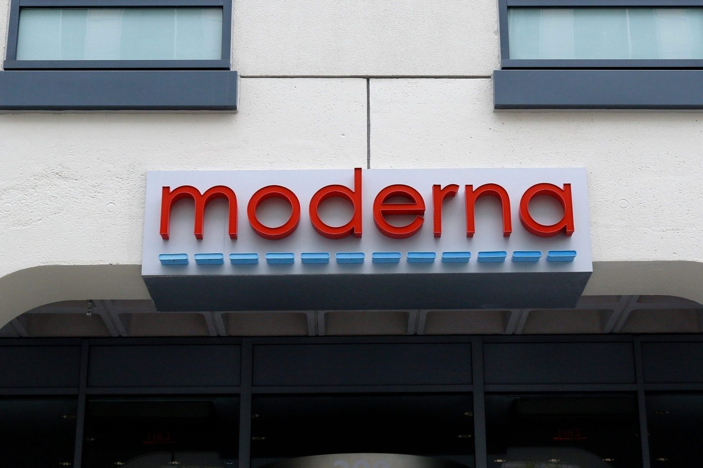 FILE - A sign marks an entrance to a Moderna building in Cambridge, Mass., May 18, 2020. (AP Photo/Bill Sikes, File)