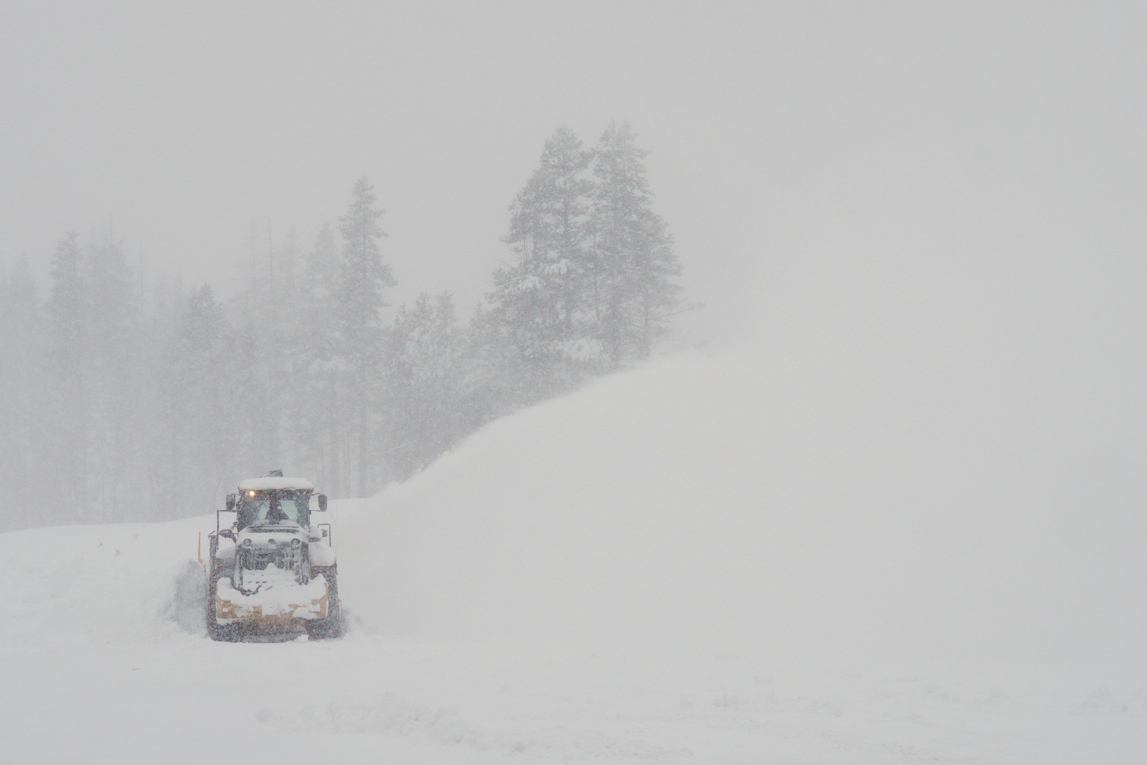 A road is cleared during a snow storm on Wednesday, Feb. 18, 2026 near Soda Springs, Calif. (AP Photo/Brooke Hess-Homeier)