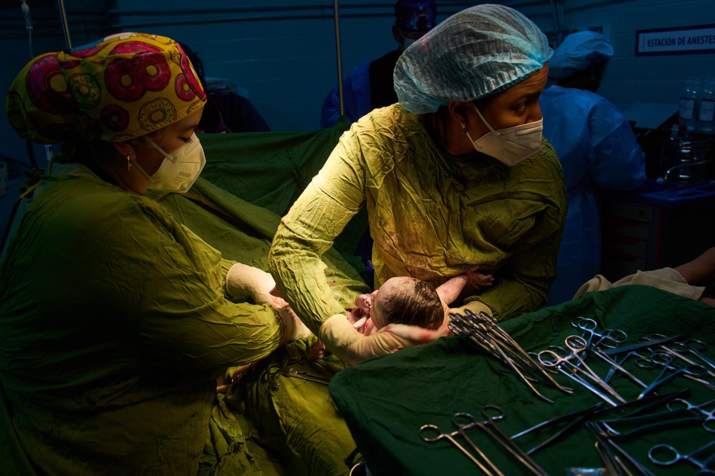 Doctors assist in a birth at the Ramón González Coro Maternity Hospital in Havana, Cuba, Friday, Feb. 20, 2026. (AP Photo/Ramon Espinosa)