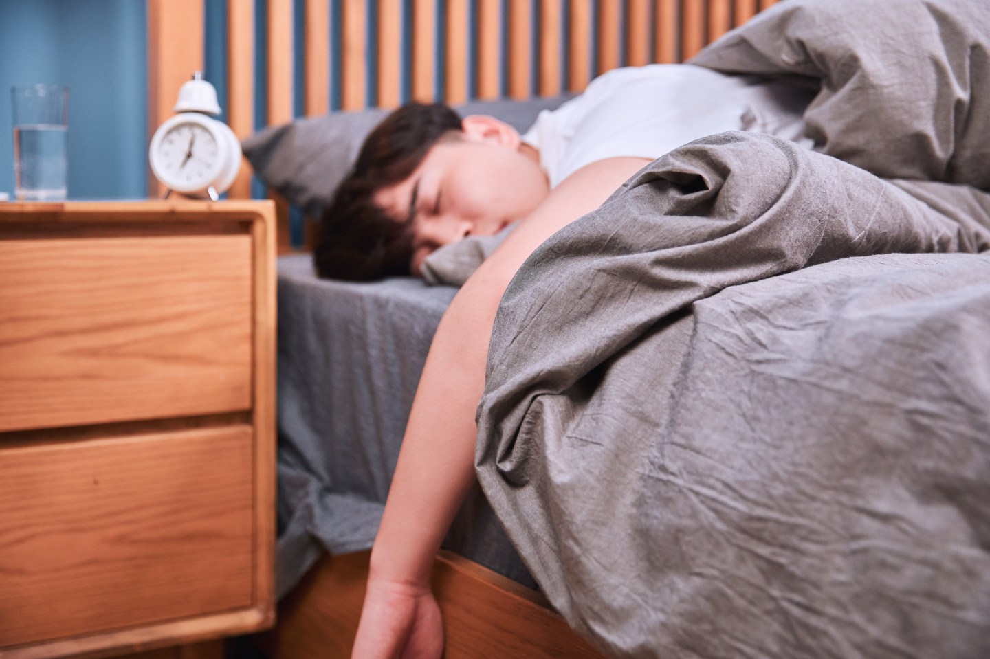 A person sleeping in bed.