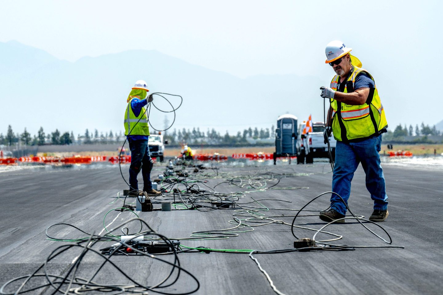 Electricians at work at the Ontario airport.
