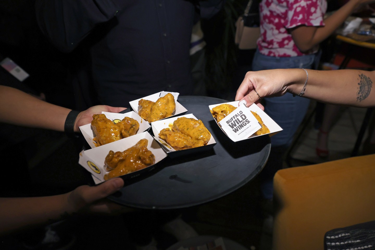 AUSTIN, TEXAS - MARCH 10: Buffalo Wild Wings are seen during the Variety Power Of Comedy Presented By Inspire Brands at The Creek and The Cave on March 10, 2023 in Austin, Texas. (Photo by Mat Hayward/Variety via Getty Images)