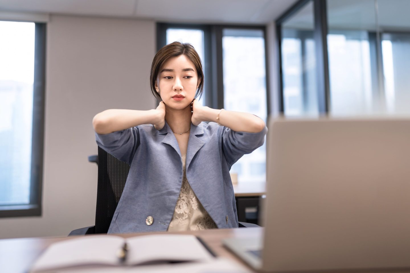 Stressed and sad worker in office