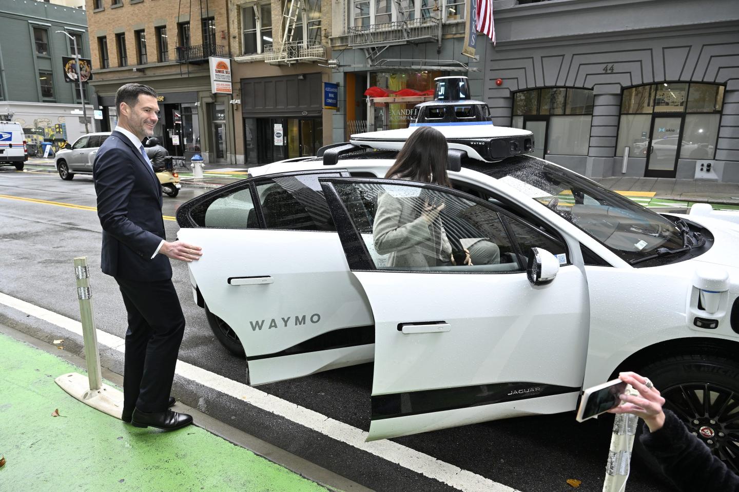 Some Waymo riders are so lazy that gig workers are getting paid $24 to close the door for them