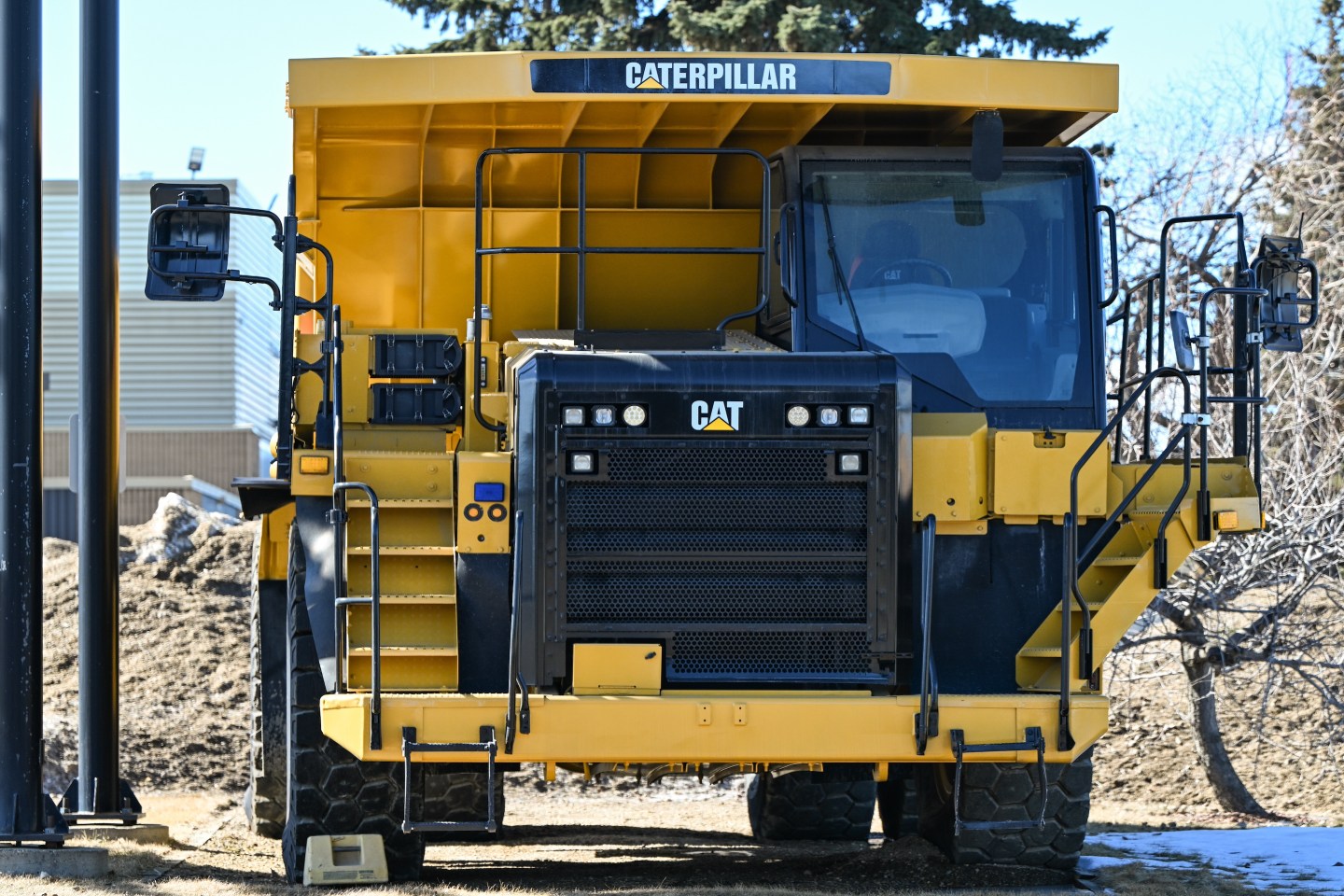 A Caterpillar 773G off-road dump truck parked outside Finning, a leading Canadian dealer of Caterpillar industrial equipment, in Edmonton, Alberta, Canada