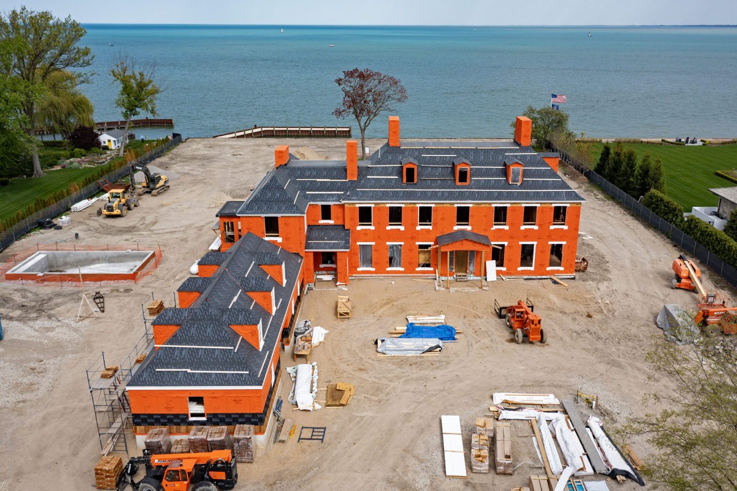 Grosse Pointe Park, Michigan, A luxury home under construction on the shore of Lake St Clair, where mansions this size can sell for $3 million. The house is being built by Thomas Sebold &amp; Associates (TSA). (Photo by: Jim West/UCG/Universal Images Group via Getty Images)