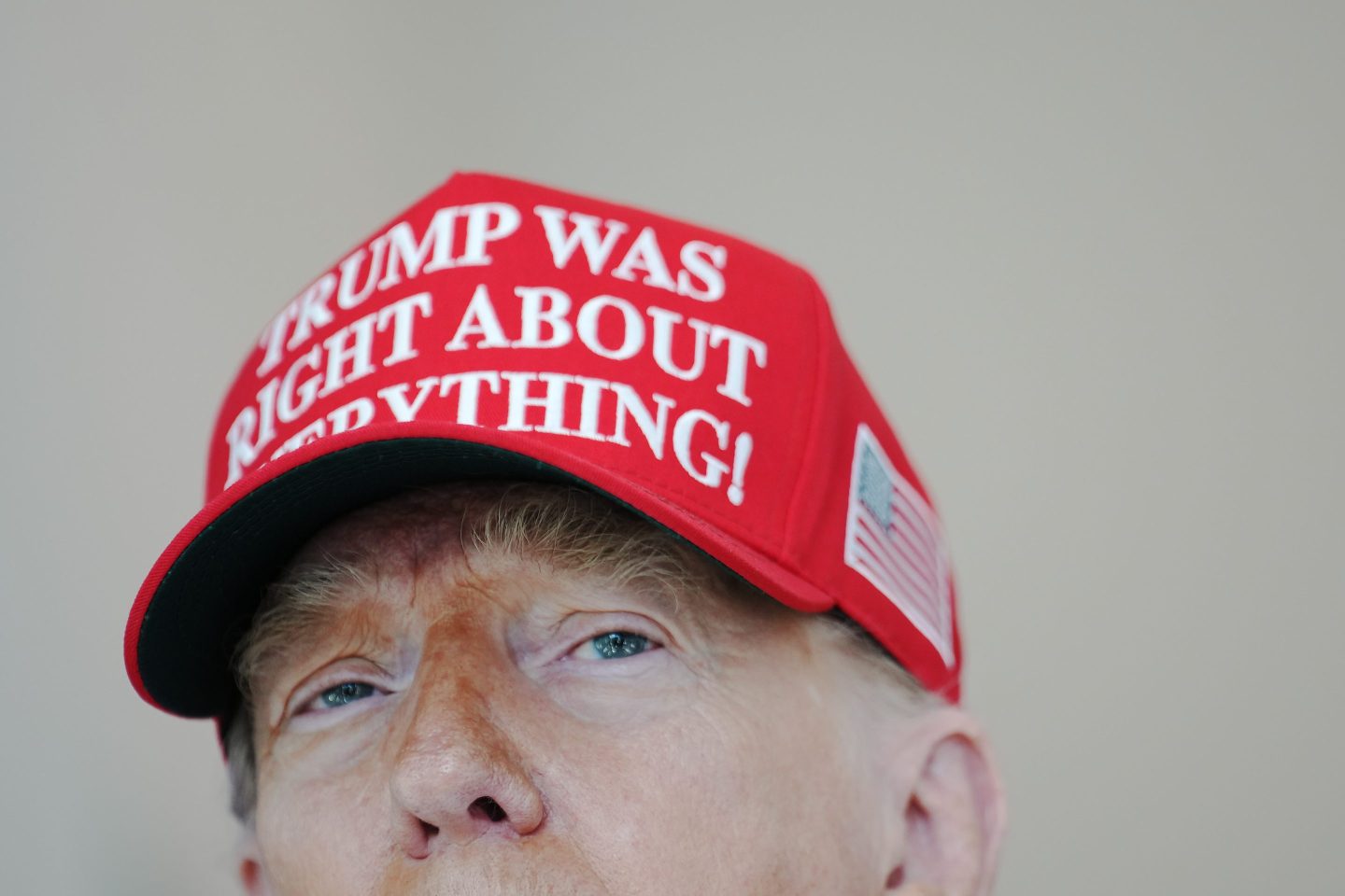 President Donald Trump speaks to the media wearing a hat that reads, "Trump Was Right About Everything!," during a visit to The People's House: A White House Experience August 22, 2025 in Washington, DC.