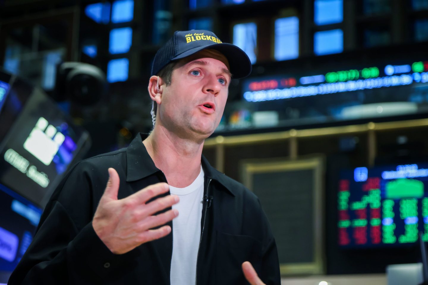 Siemiatkowski speaks in front of monitors at the New York Stock Exchange.