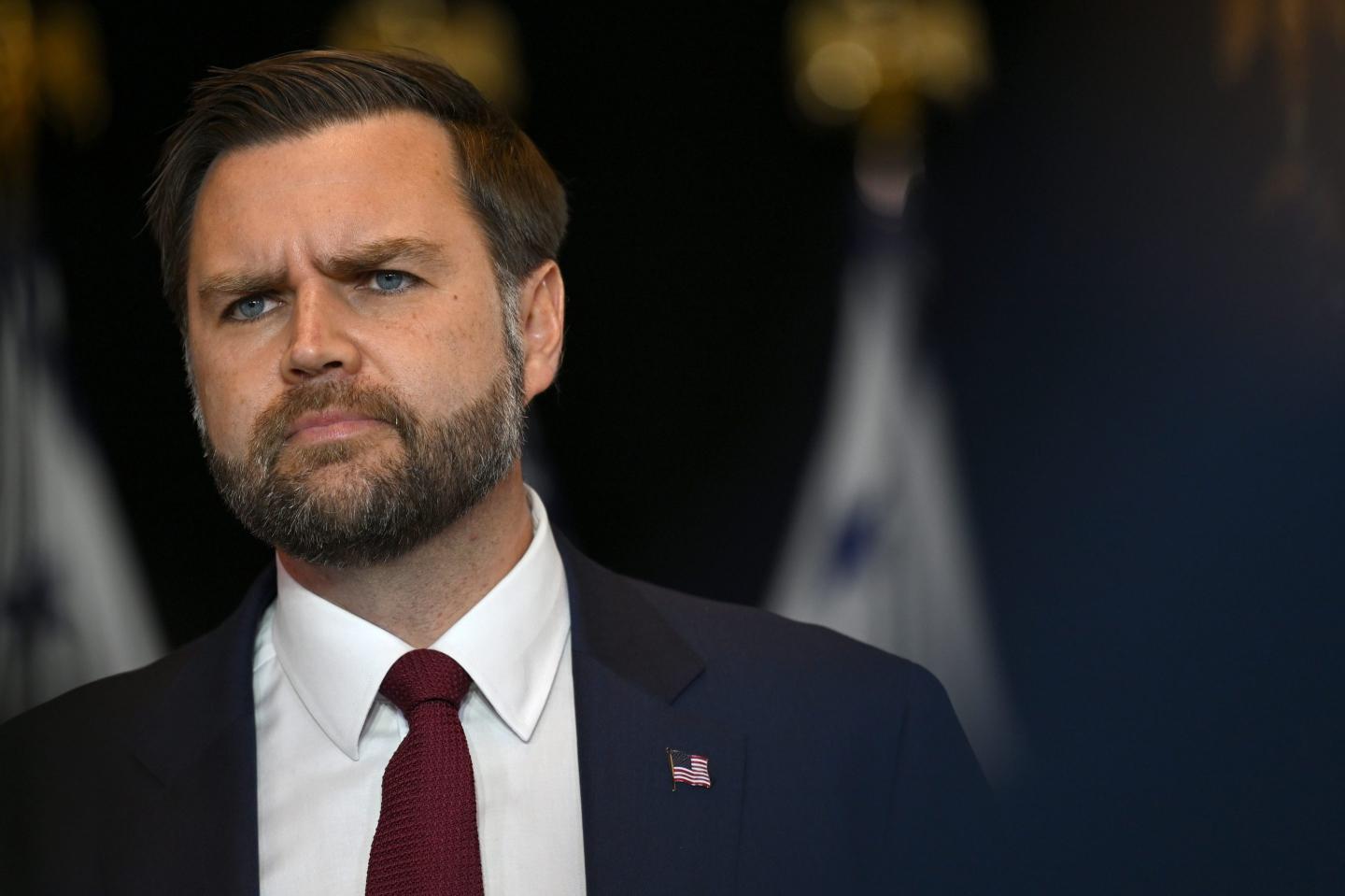 Vice President JD Vance looking at a crowd during a speech.